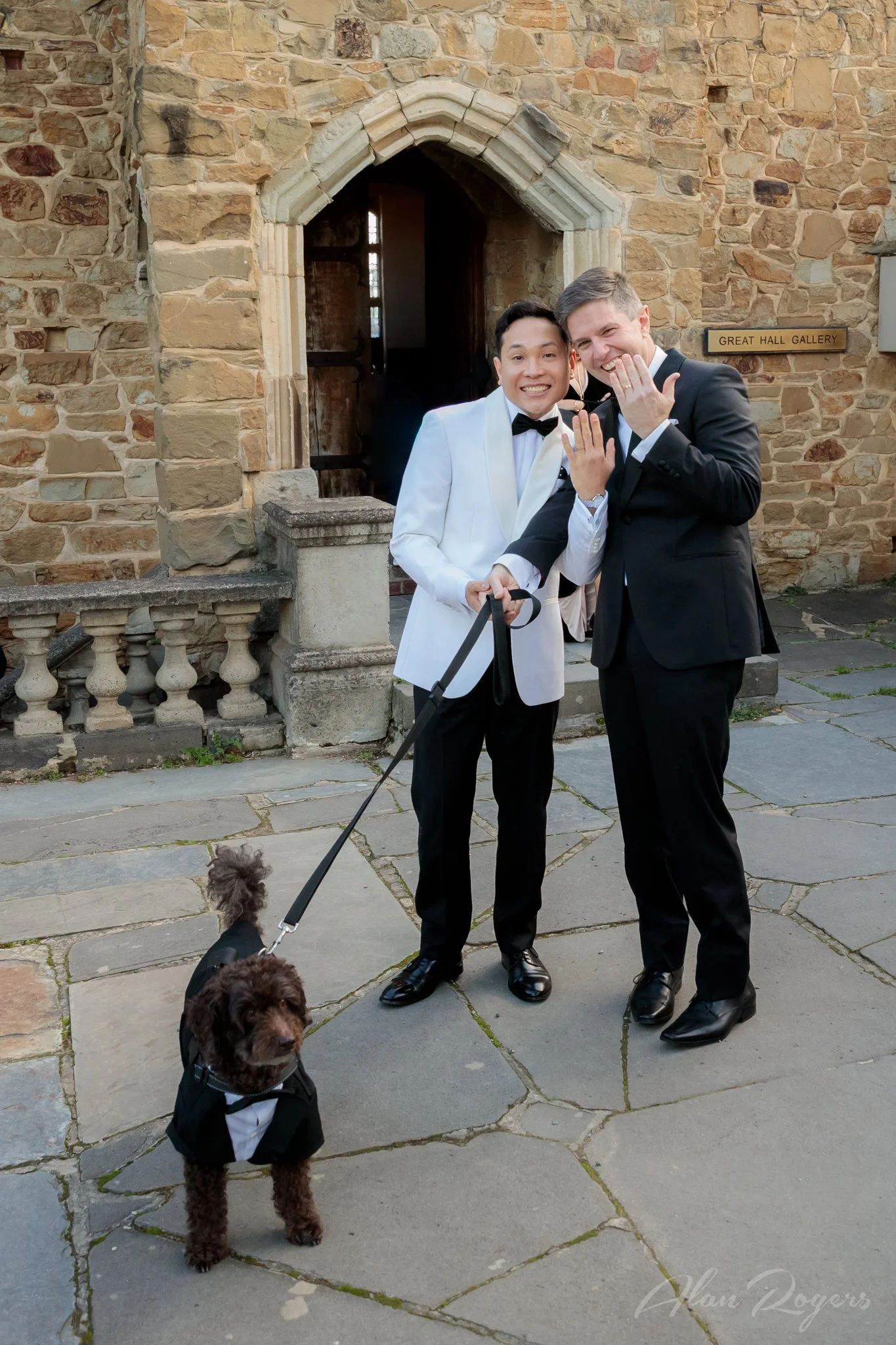 two-grooms-puppy-outside-chapel.jpg