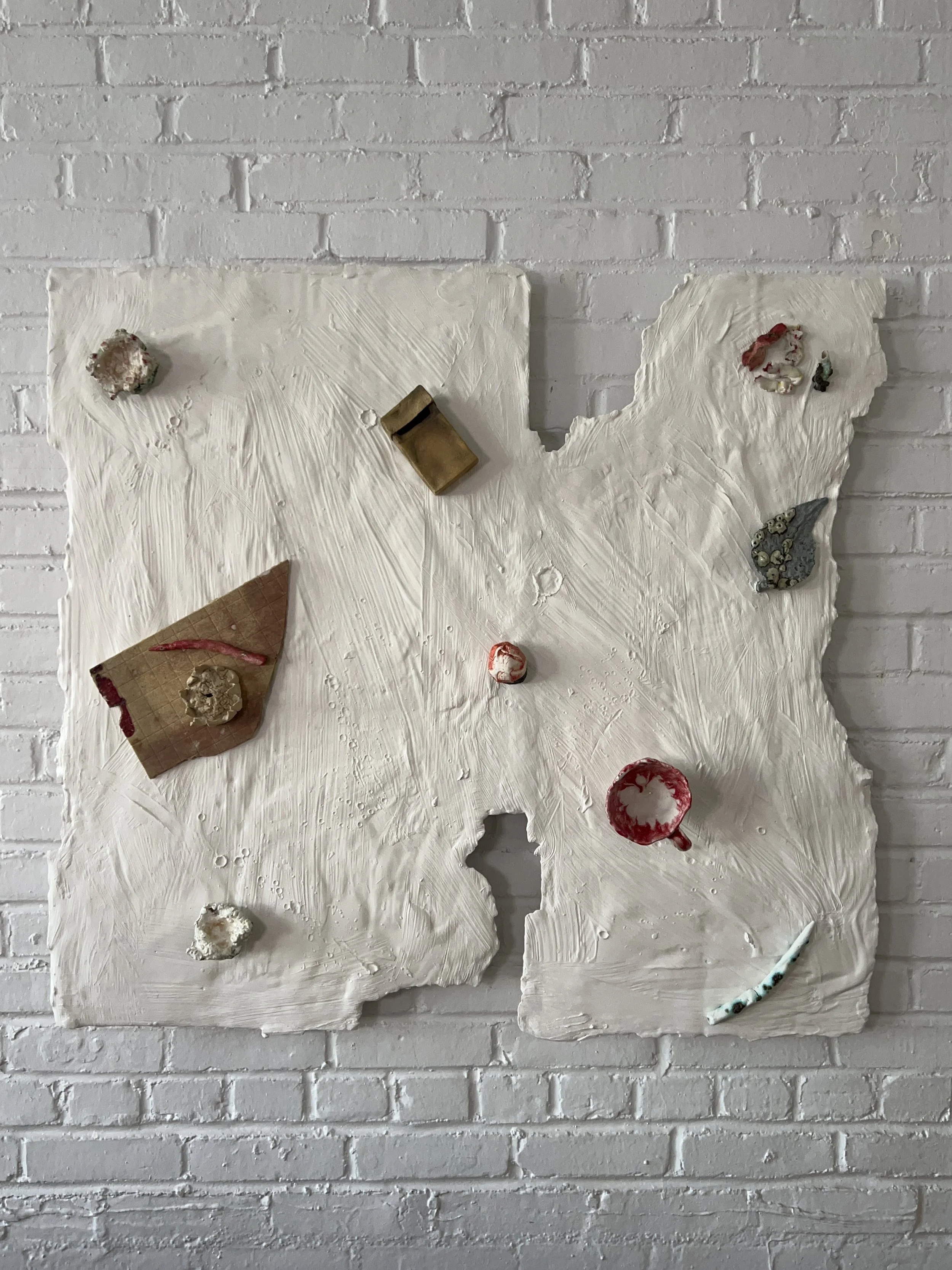  2024  Glazed ceramics, plaster, paint, epoxy, wood, paper   38 x 41 inches 