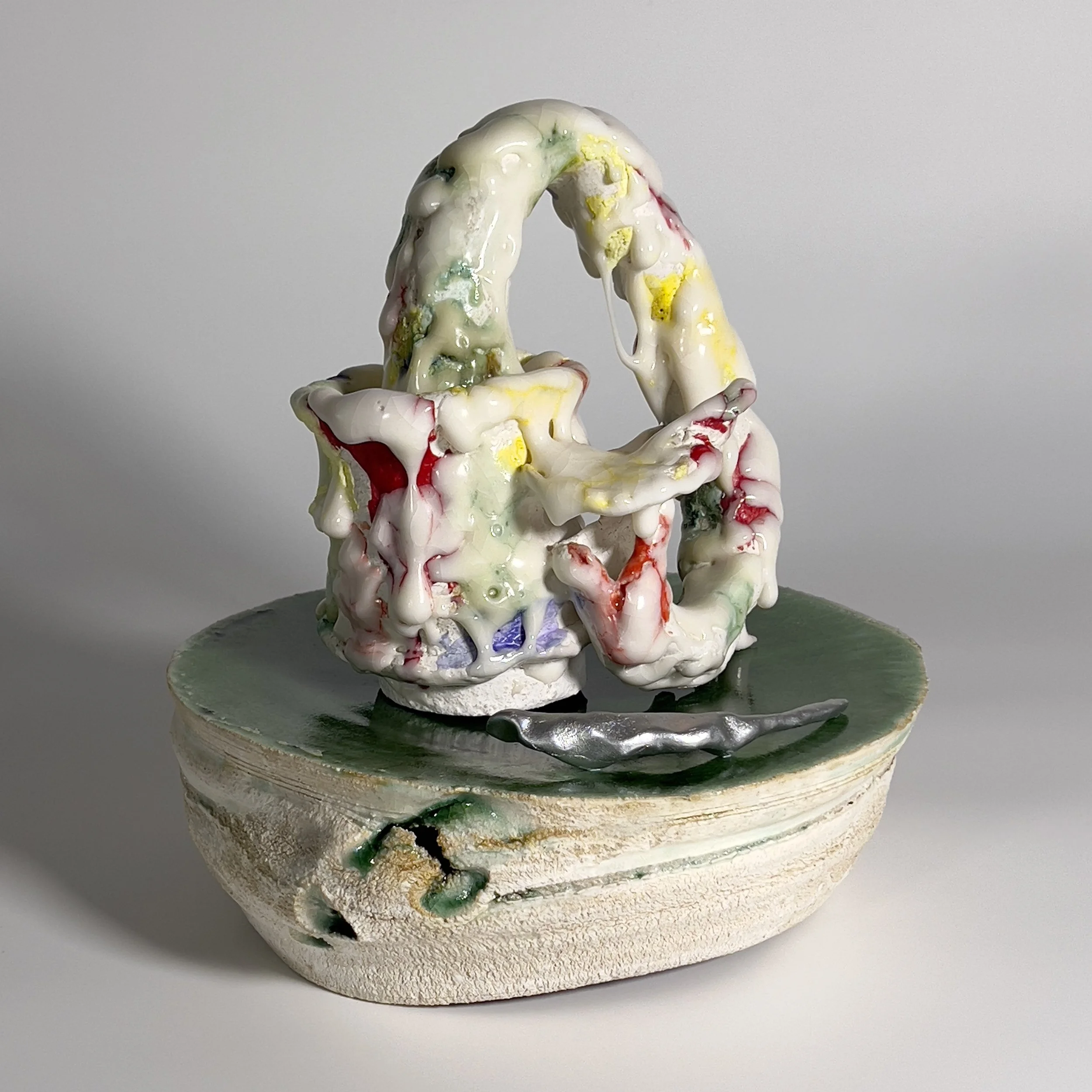  2025  Glazed ceramics, epoxy clay, ероху, metal wire, and silver spray paint  10.5 × 10 x 10 inches 