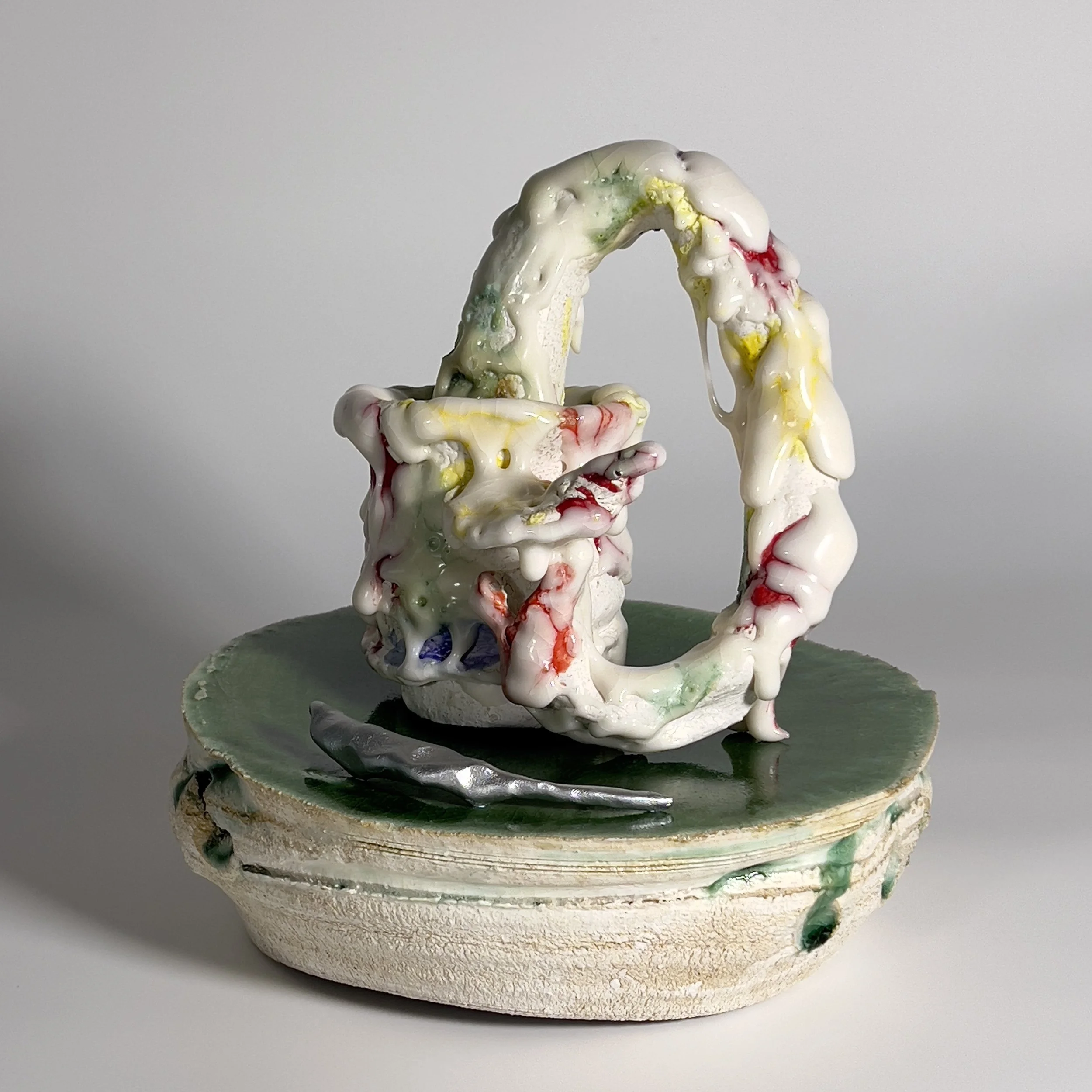  2025  Glazed ceramics, epoxy clay, ероху, metal wire, and silver spray paint  10.5 × 10 x 10 inches 