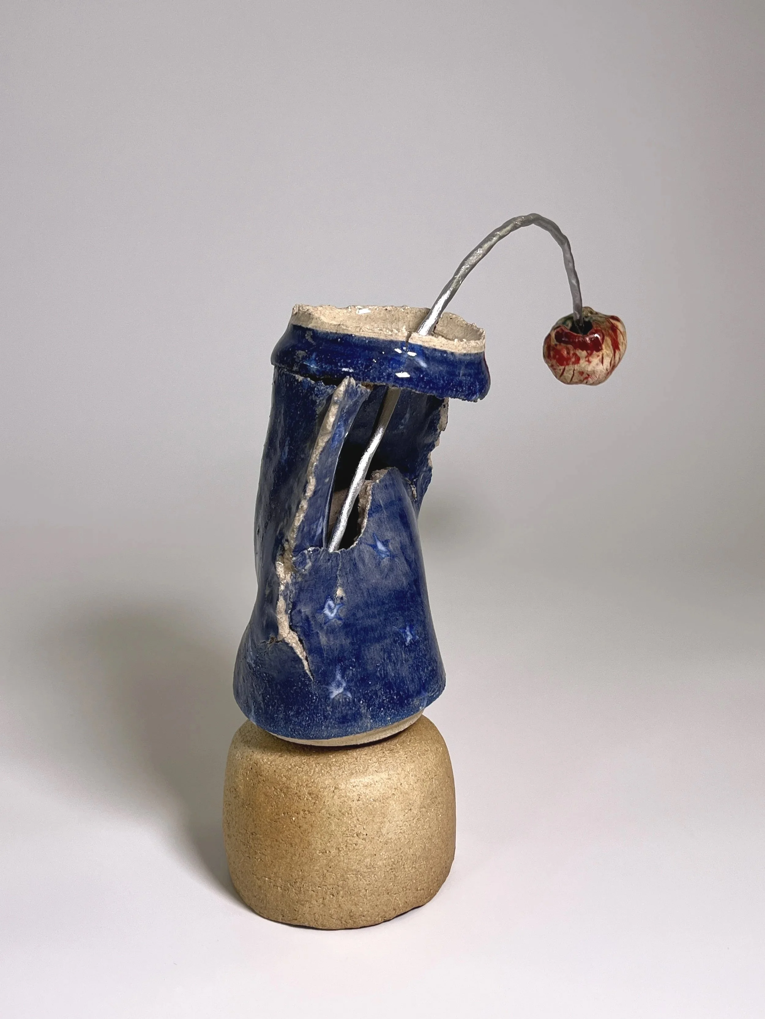  2026  Glazed ceramics, metal wire, epoxy, epoxy glue, and silver spray paint  12 × 14 × 4.5 inches 