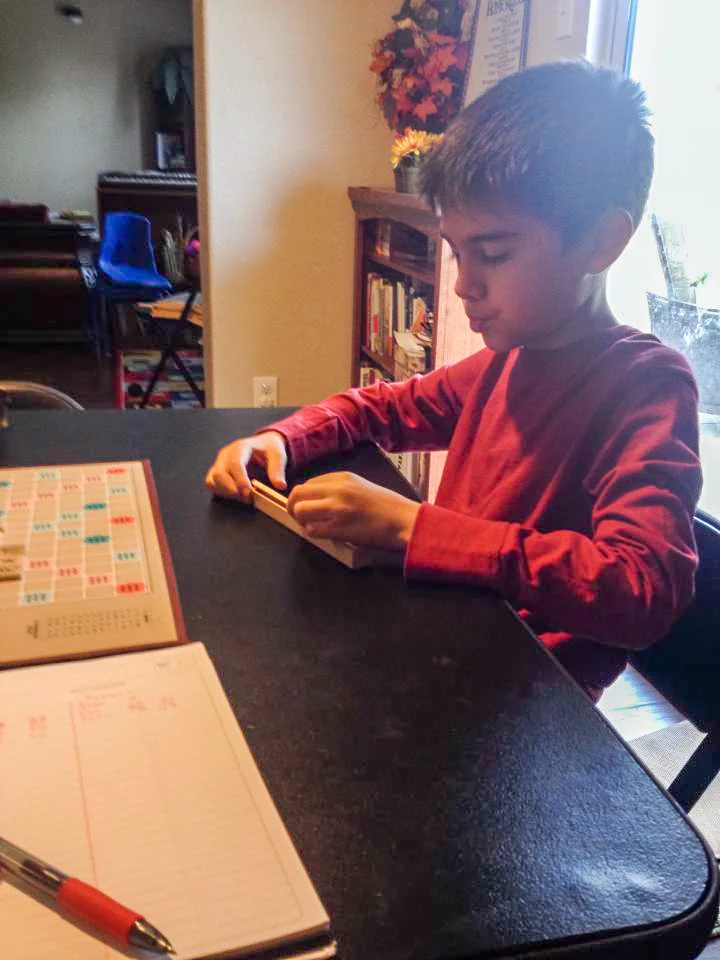 Joaquin about to place a seven-letter word.