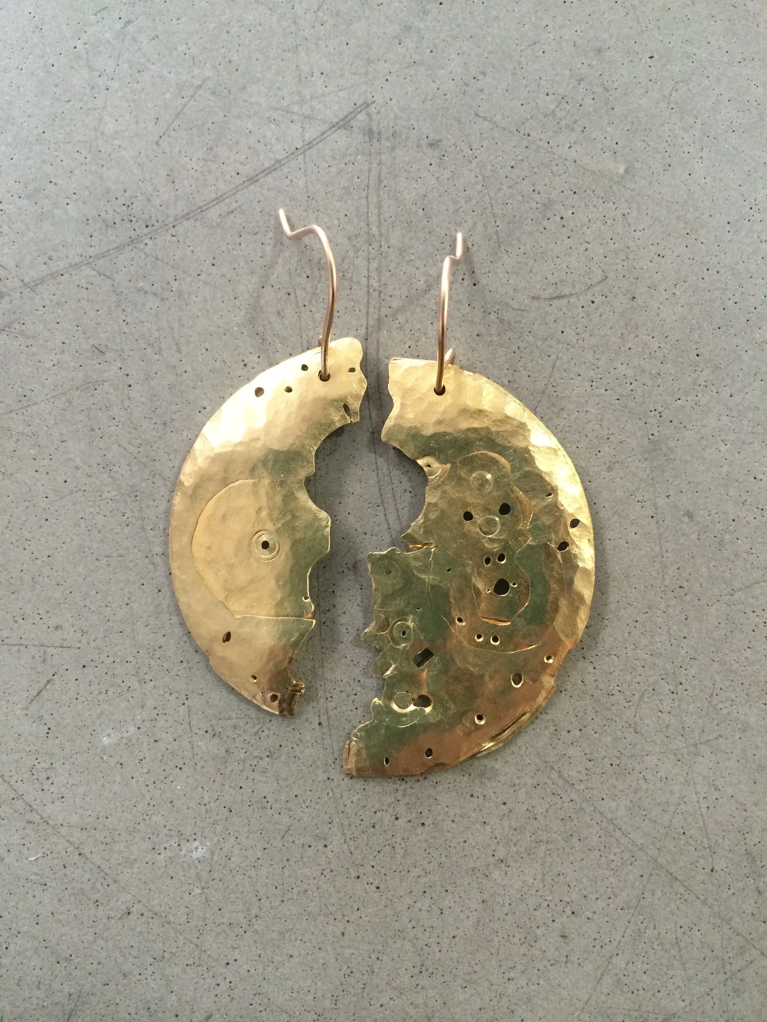 Adjust Brightness Contrast 2015 Simple, abstract, but strangely familiar forms that attract light to one's face. Brass, 9ct gold, sterling silver @selinashanti