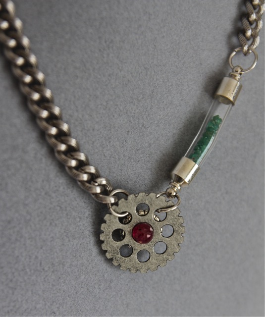Geared Up (ruby, emerald, steel, glass, pewter): Elixir collection