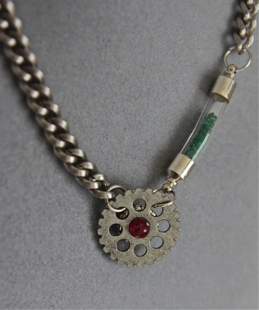 Geared Up (ruby, emerald, steel, glass, pewter): Elixir collection