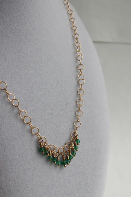Trellis (garnet, green onyx, gold plated brass)