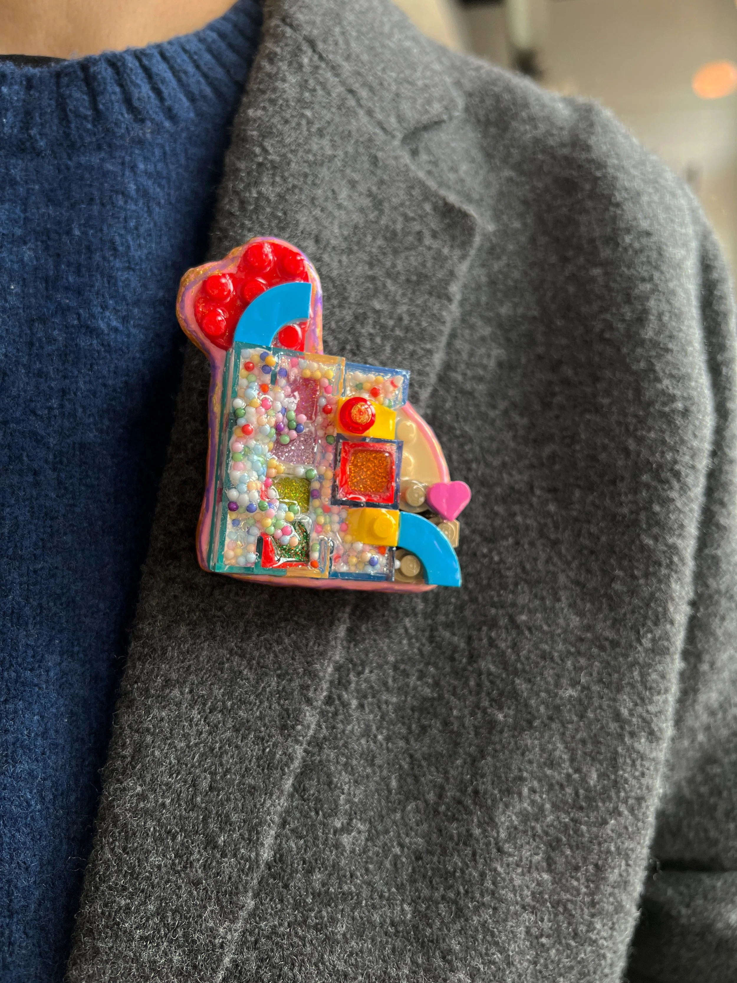 Funhouse scale brooch.jpg