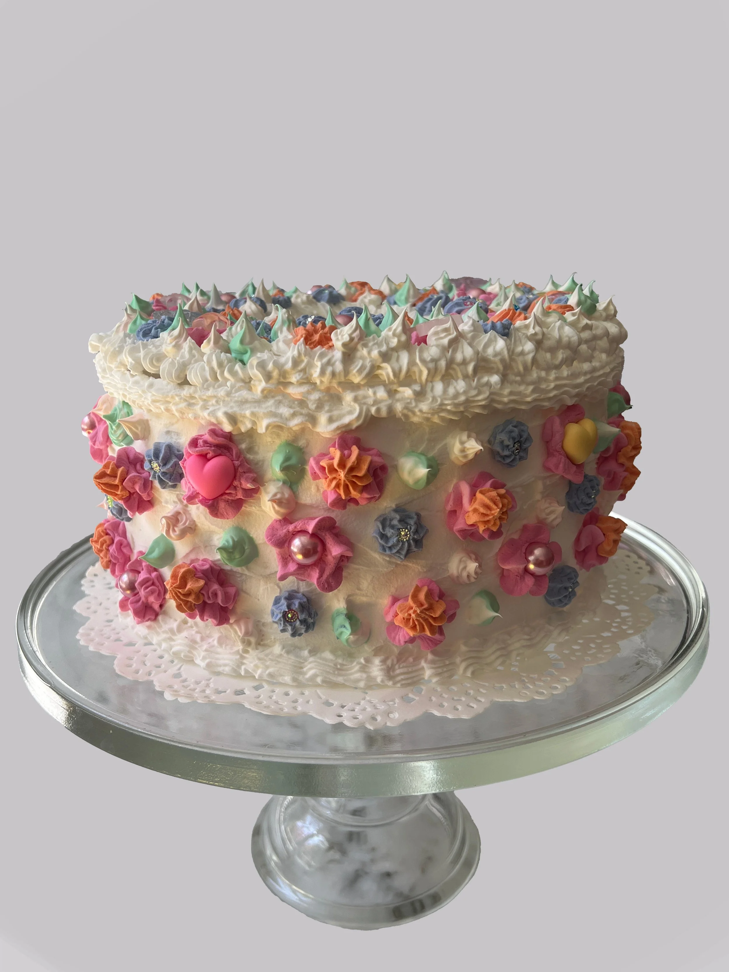 Flower Power cake on ped.jpg