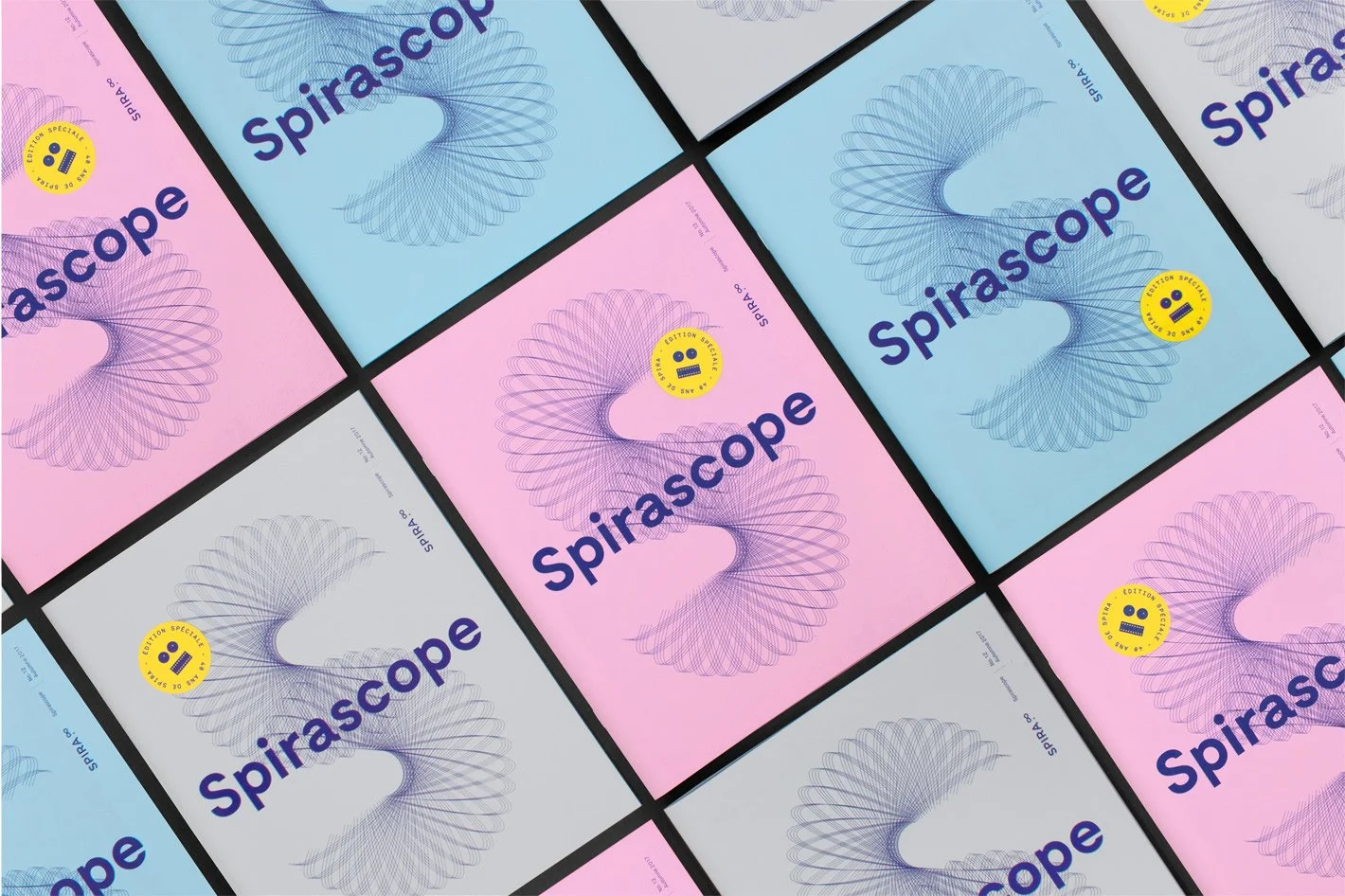 Plusieurs magazines Spirascop disposés à angle sur un fond noir.