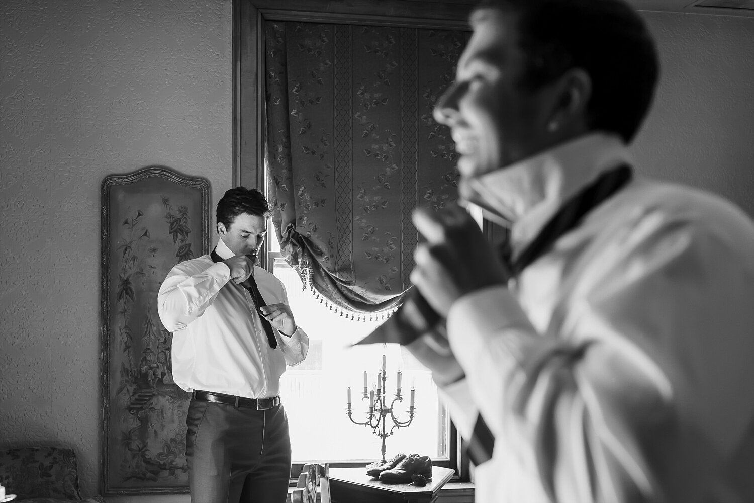  A groom and his brother get dressed in a historic venue on Woodward Ave in Detroit.  