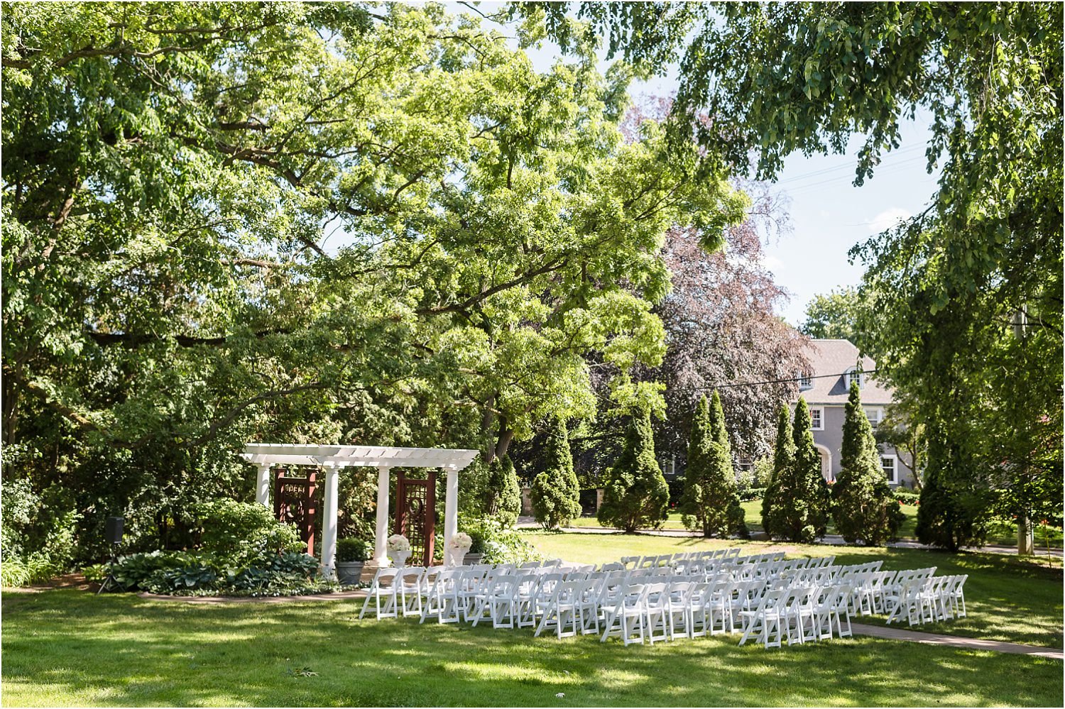  A beautiful outdoor ceremony site under a pergola in Ann Arbor.  