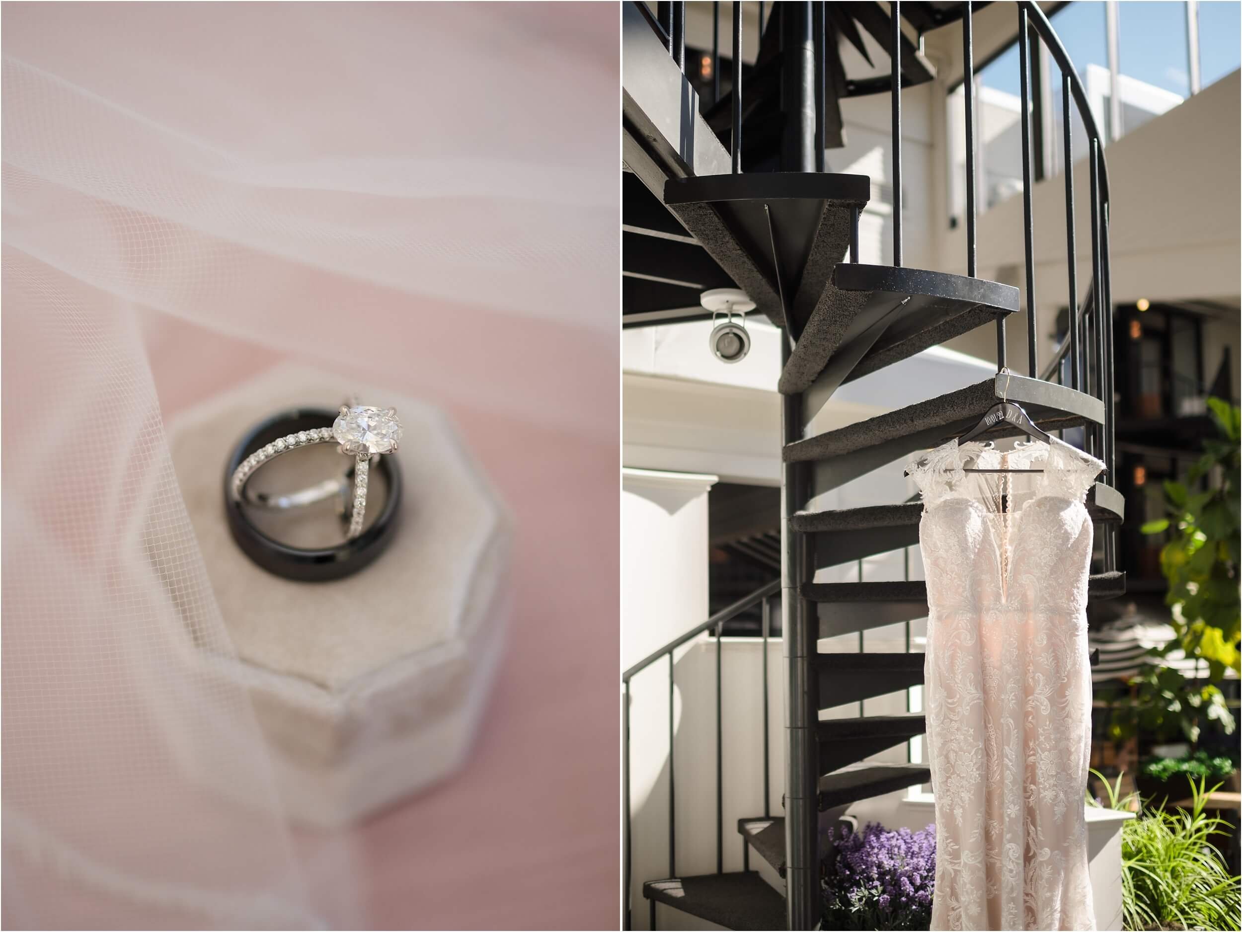  A close-up of wedding rings and a dress hanging on a spiral staircase inside Webers Hotel.  