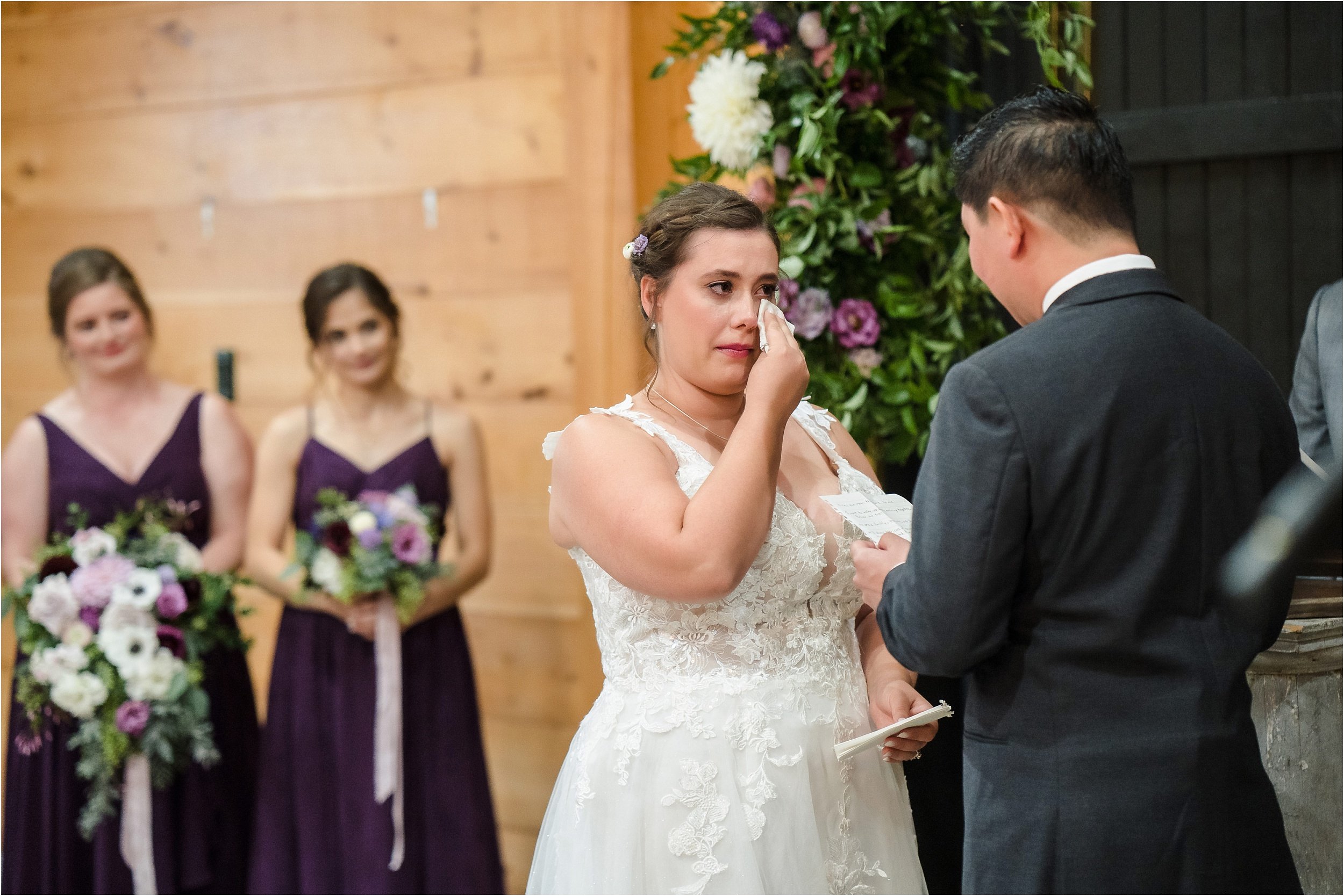  A bride tears up during her vows.  