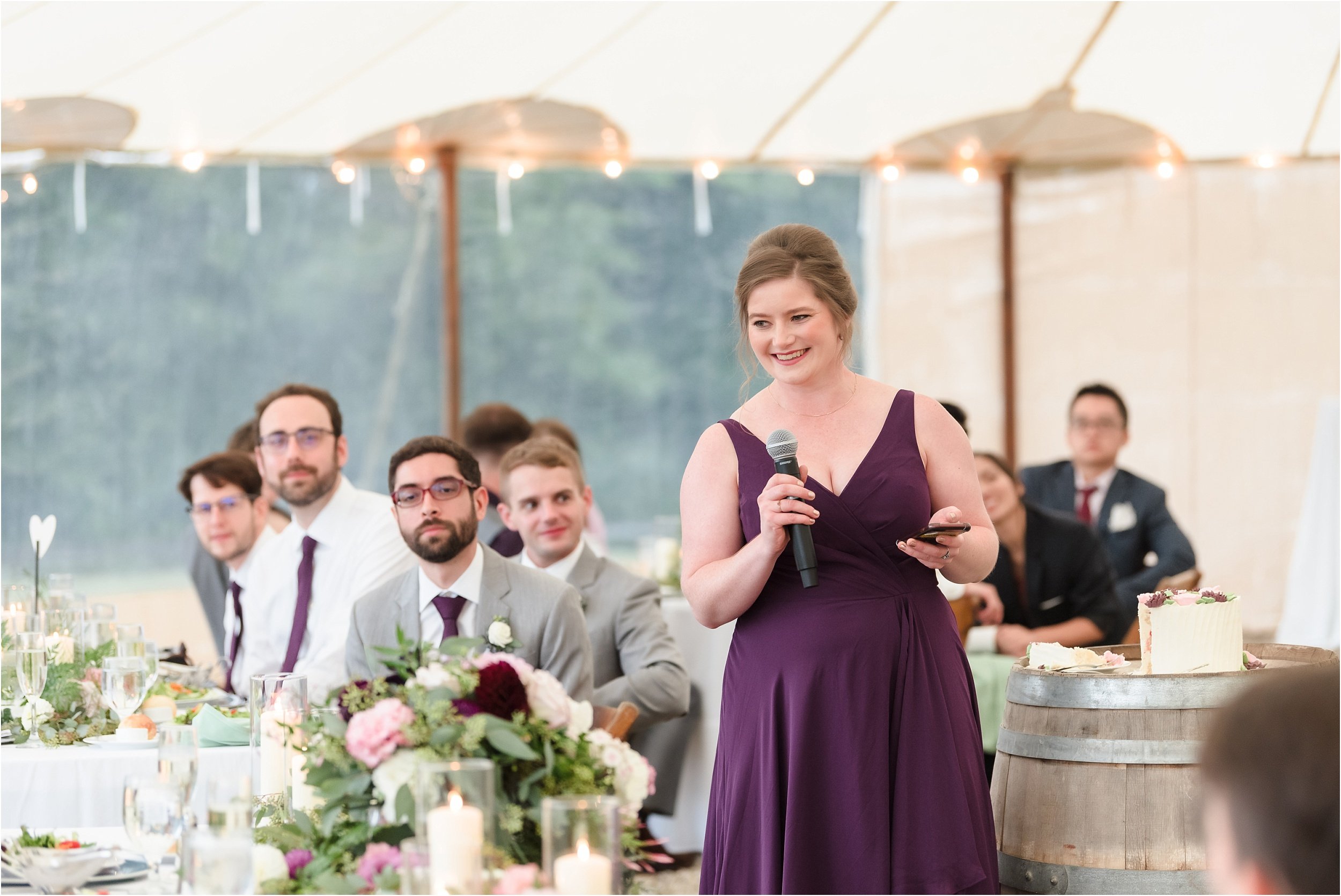  A bridesmaid toasts her friend, the bride, at their farm wedding outside of Ann Arbor.  