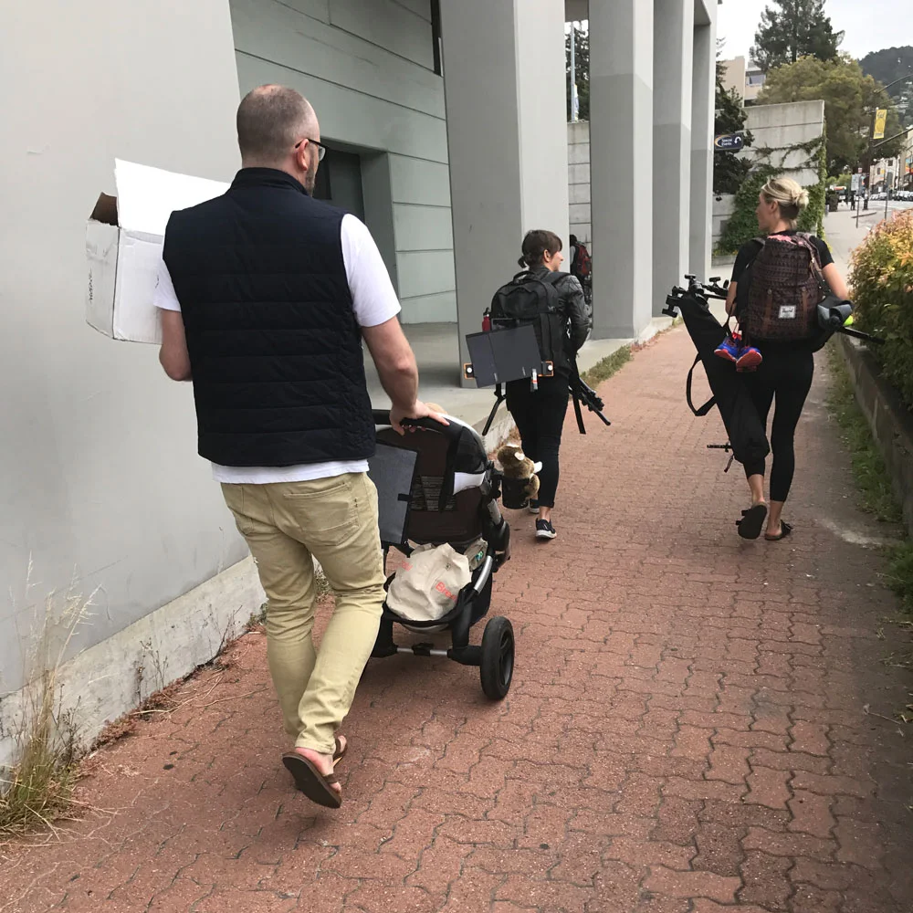 Loading in for day two at Edwards Stadium, the UC Berkeley track, complete with photography equipment, a big box of flystyle, and a toddler.