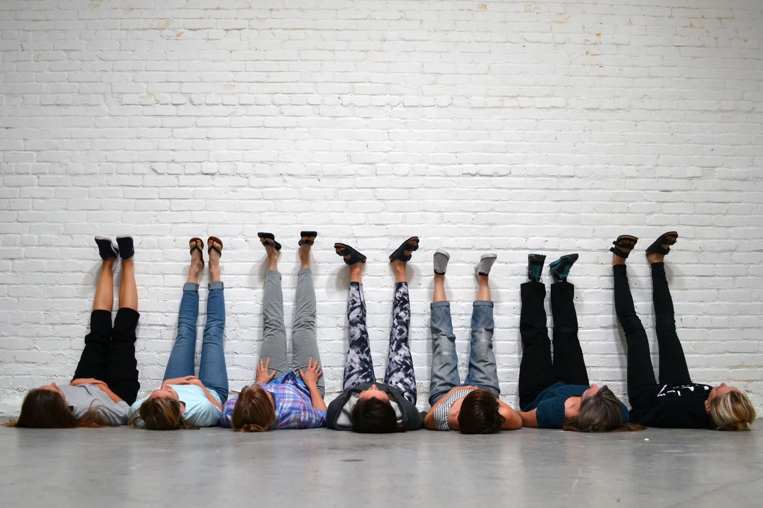 team-legs-up-the-wall.jpg