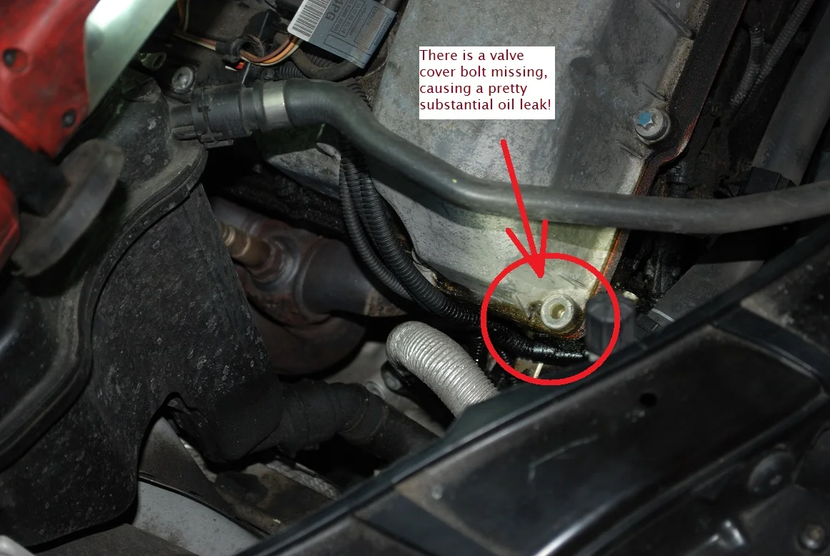 325xi oil leaks and starter close up explained.jpg