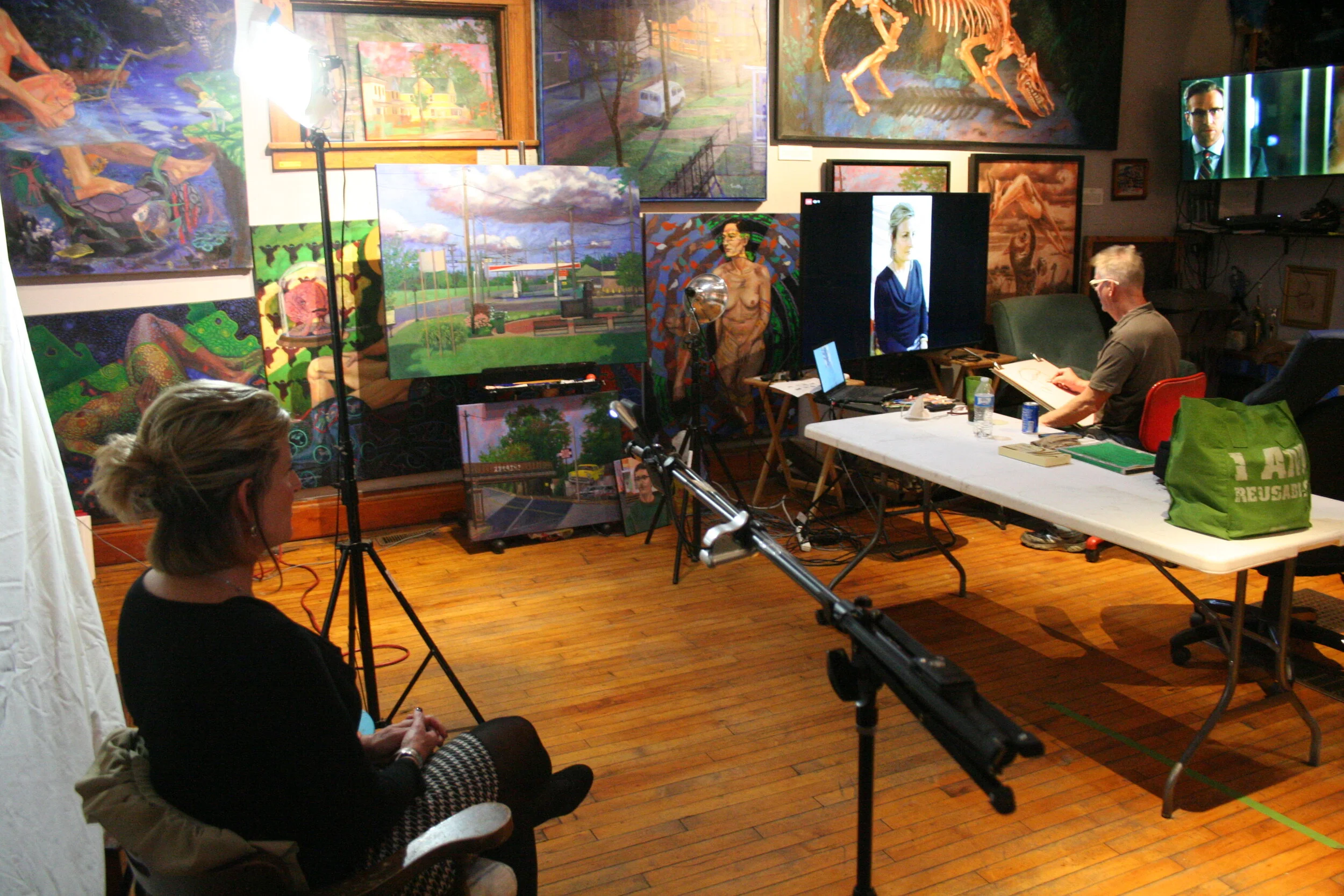 Dawn Kendrick posing while I'm drawing from the wide screen. Photo by Brian Pierce.