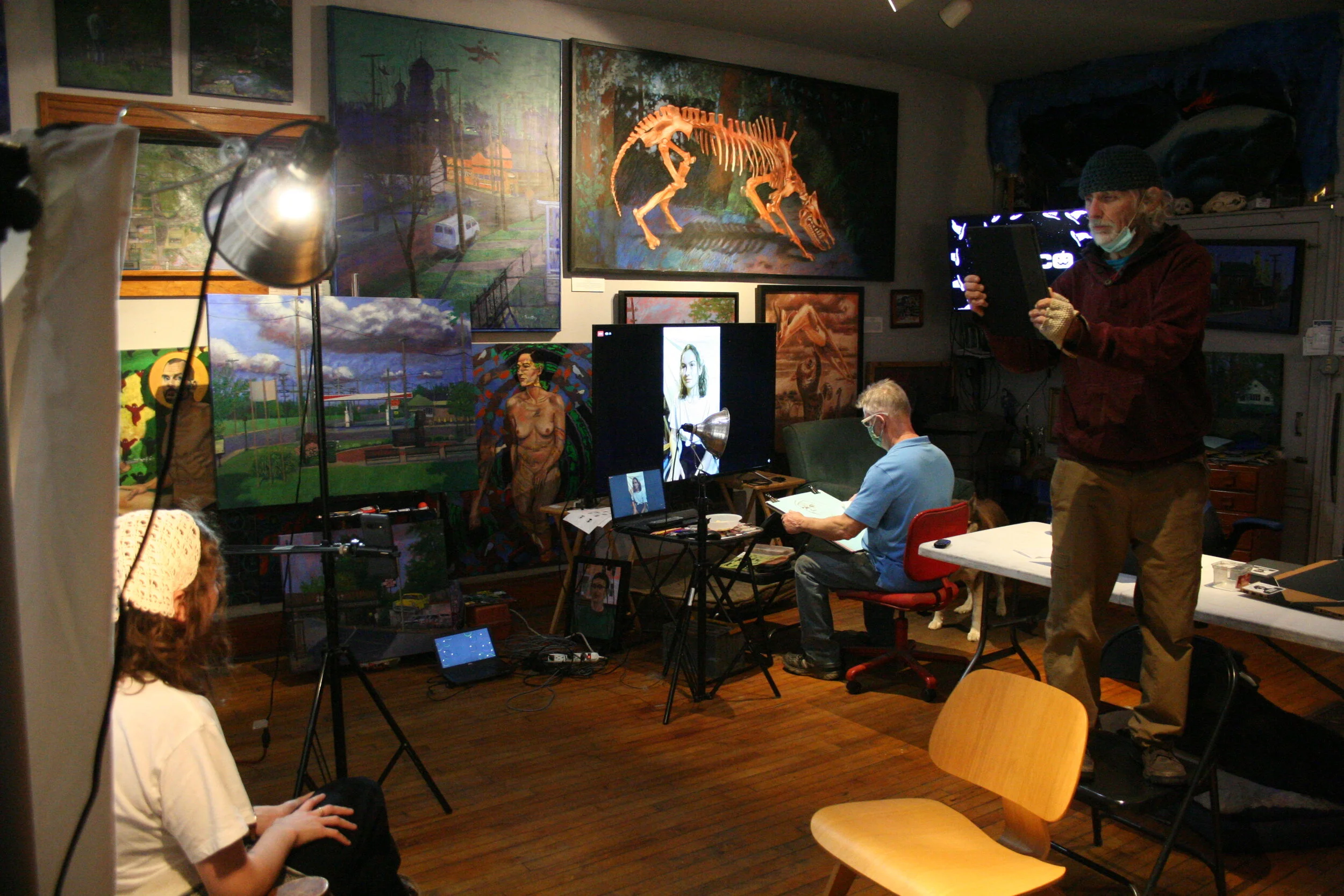 Larry Zuzik taking pictures while Timothy Herron draws. Photo by Brian Pierce