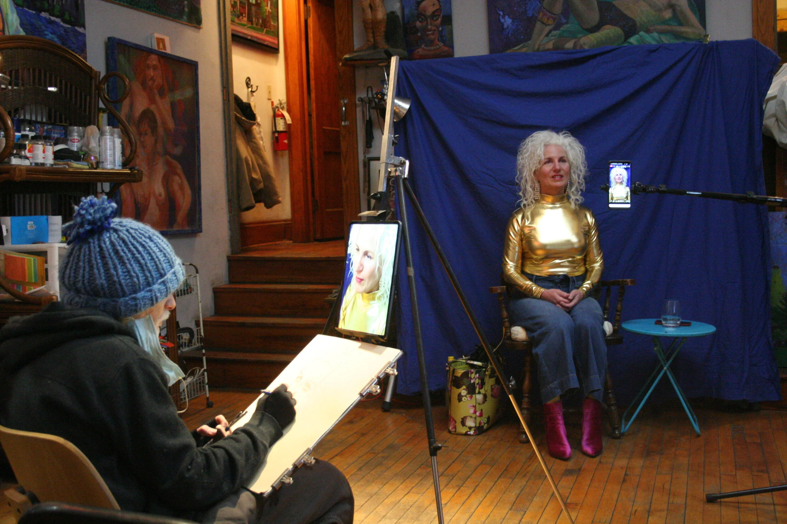 Larry Zuzik drawing from a photo he took with his I Pad. Photo by Brian Pierce