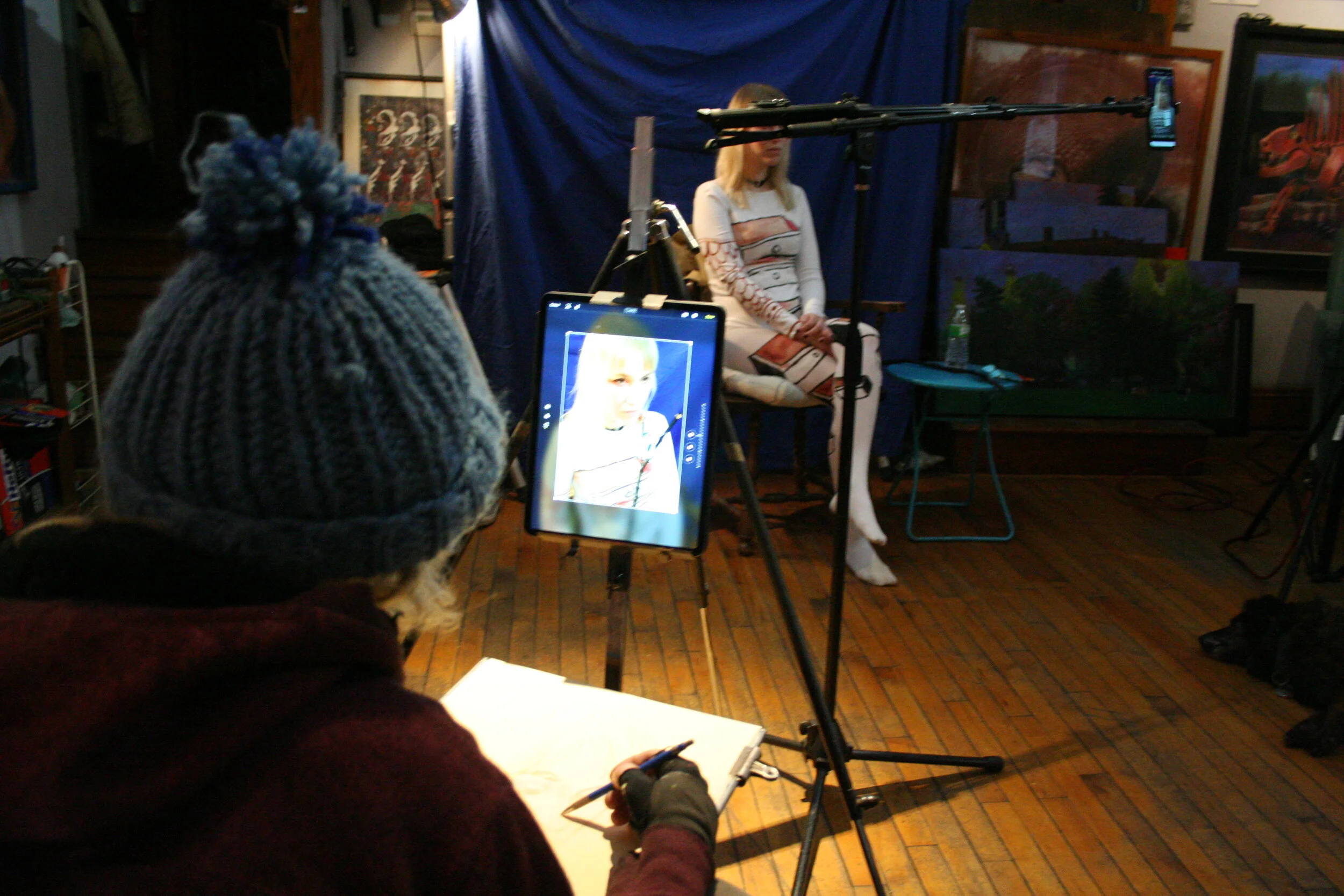 Larry Zuzik drawing from I Pad. (the lighting on the model is quite low so it's hard to draw the model directly) Photo by Brian Pierce