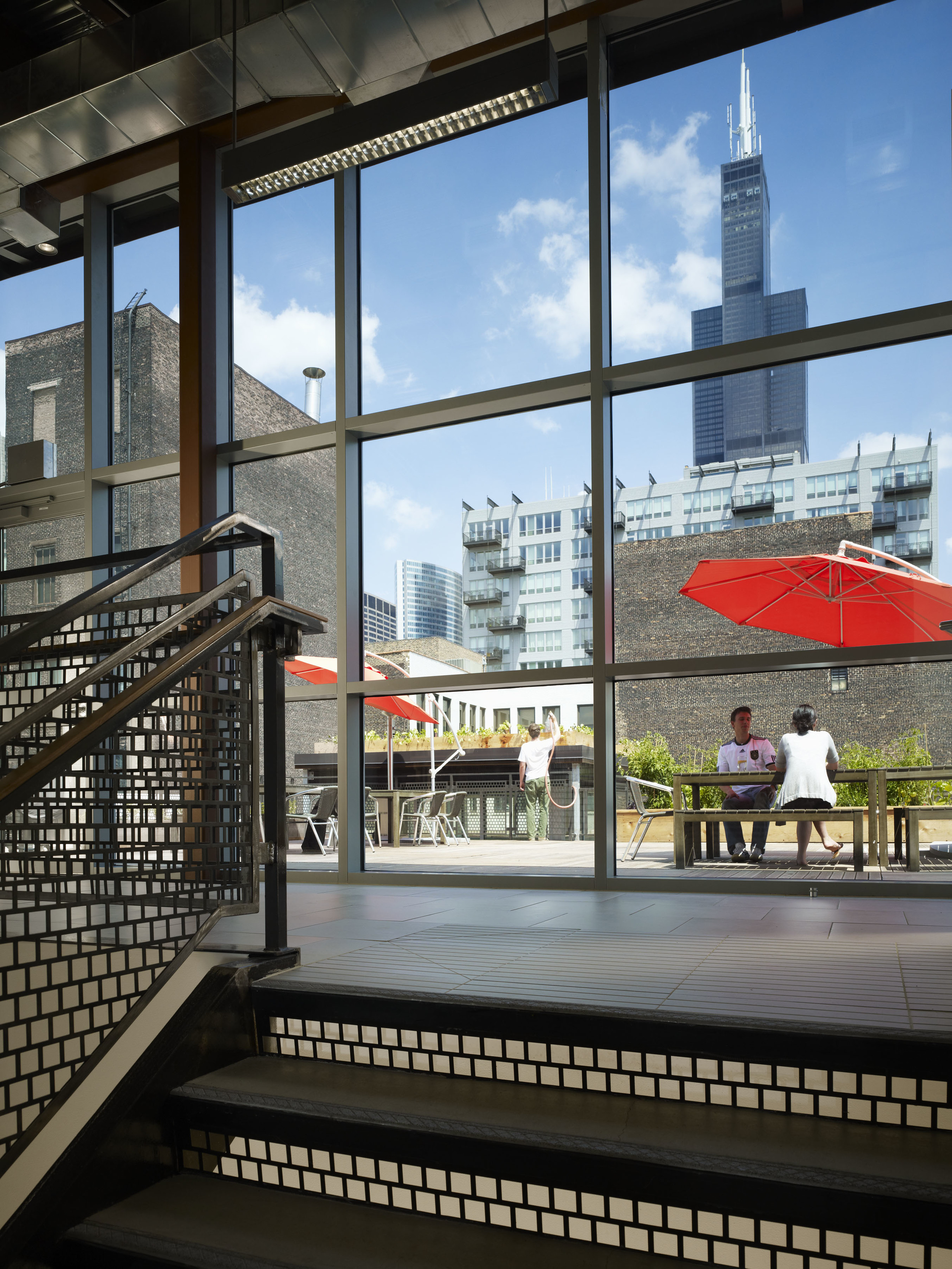 This is one of my favorite spaces in the IDEO office: our roofdeck! It's a great sanity check to have some outdoor space in the middle of a busy work week. Bonus: during the summer we hold outdoor movie nights out there. Photo by Steve Hall (C) 2010 Hedrich Blessing Photography