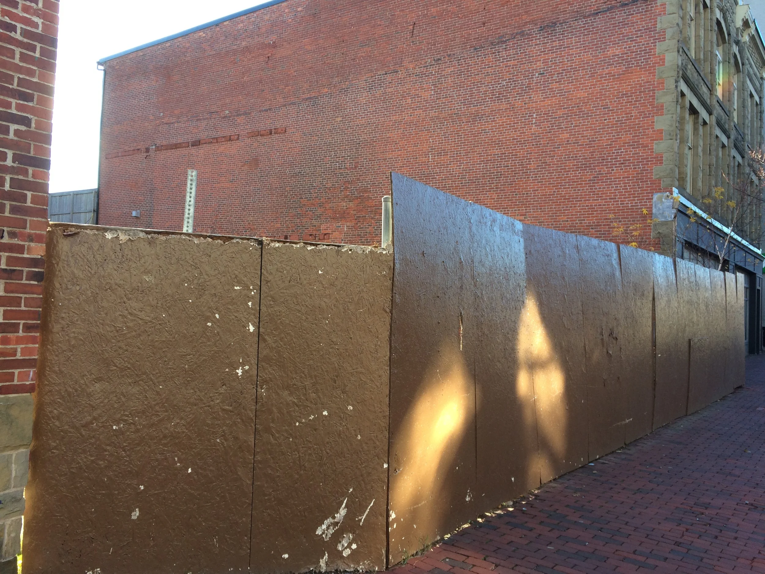 This image frustrates me. How long has this vacant lot sat unoccupied? It’s prime real estate which is now just sitting there with a fence around it. I believe it was an explosion that decimated the previous building, but now it’s just a boarded up void. What can be done with this space?