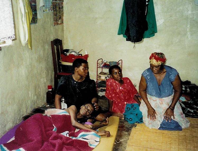 Parish Nurse Program (Swaziland): nurse visiting AIDS patient