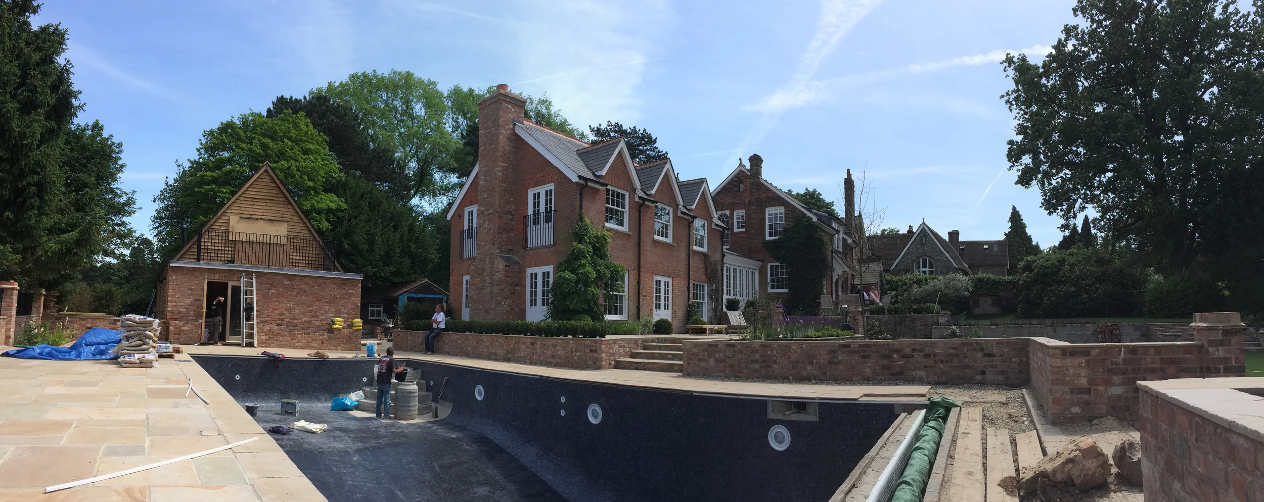 External swimming pool nearing completion.