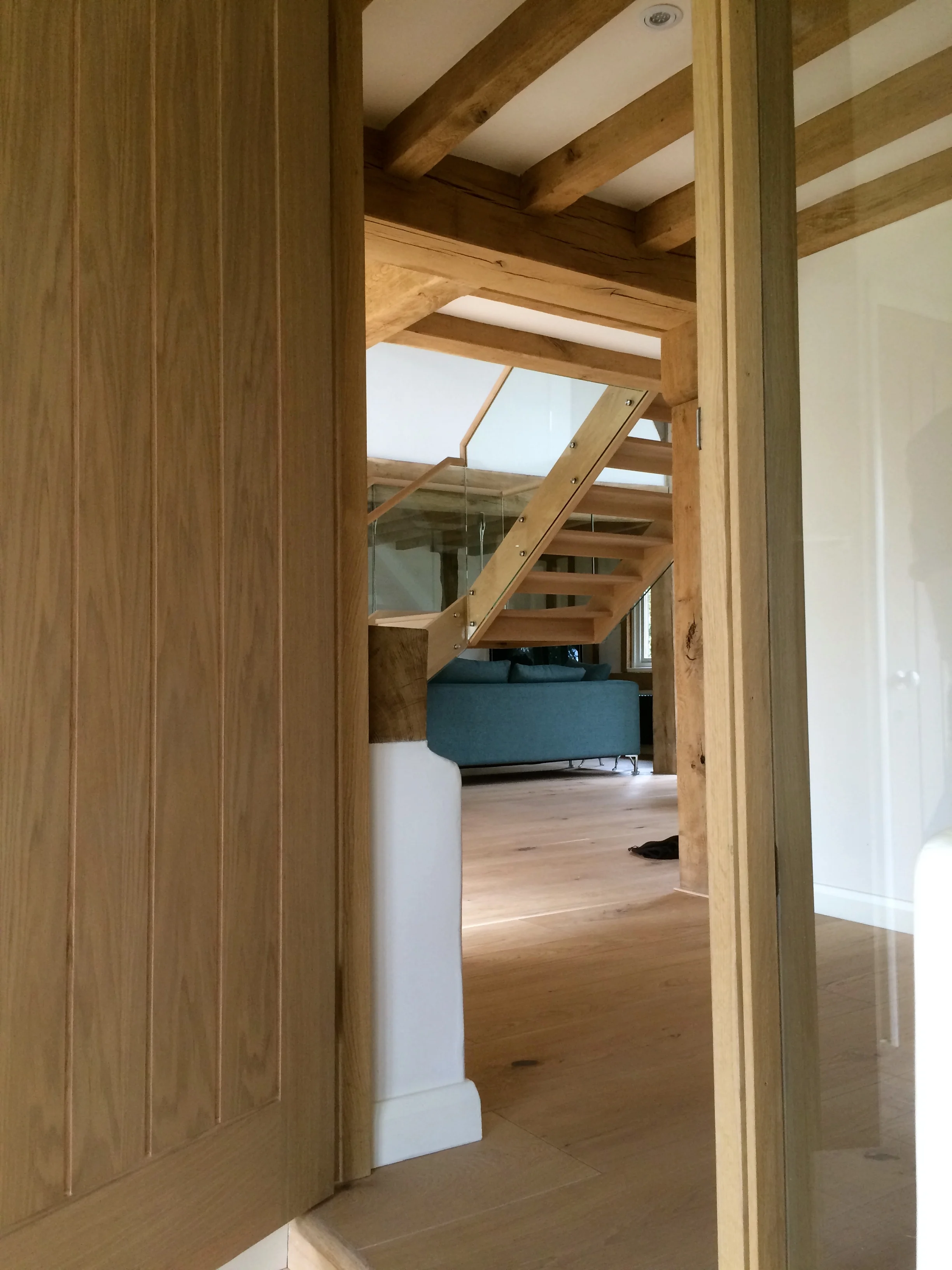 New suspended oak and glass staircase