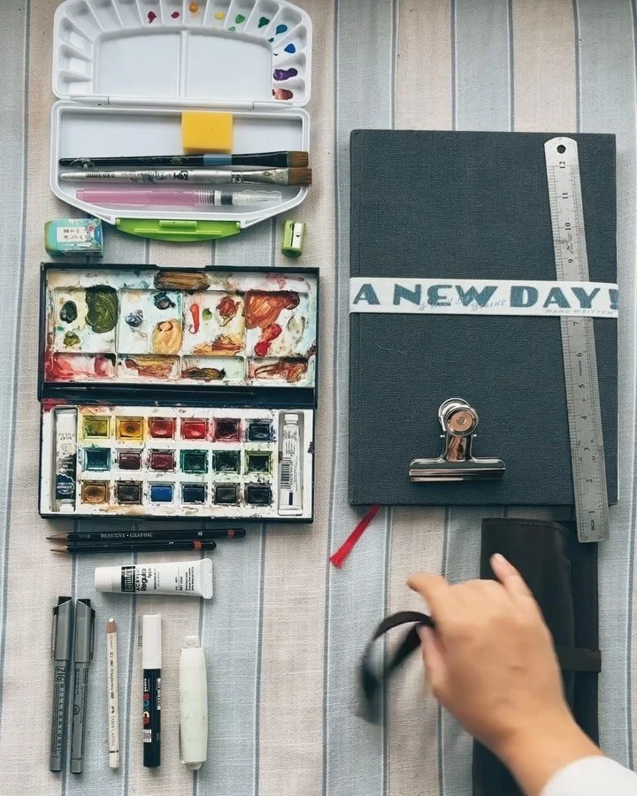 Everything I pack to document my travels. Two paint palettes (one pristine, one beautifully destroyed), a leather pencil roll, and trusty a4 sketchbook. This is my travel sketching kit, which juuust all fits in my carry-on. It served me very well for