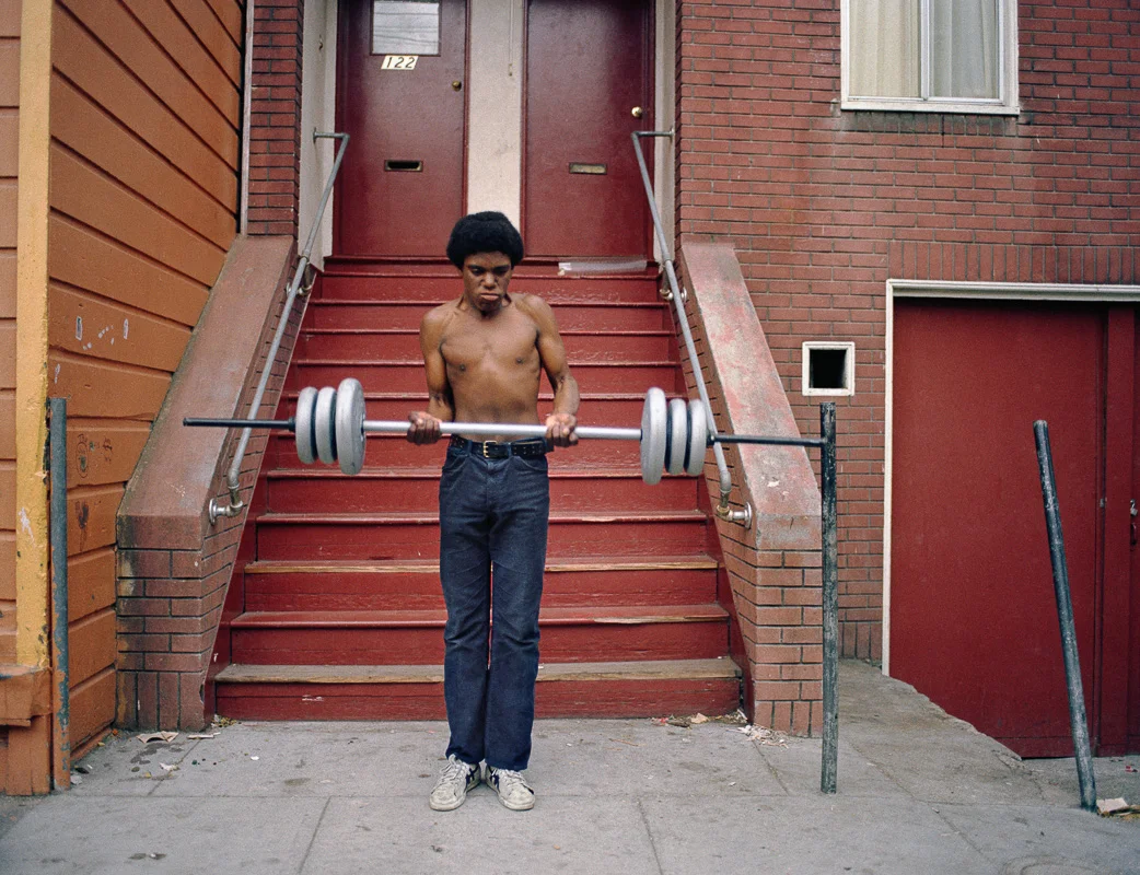  Boy lifting weights, 122 Langton Street, 1979 