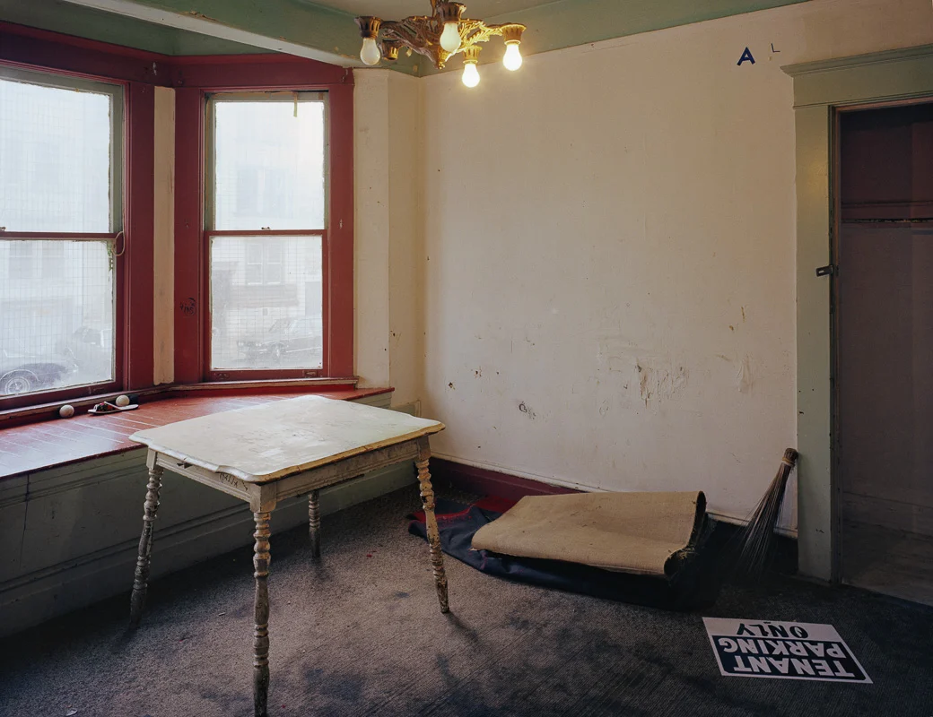  Front parlor of one of six apartments from which 90 Fillipinos were recently evicted, Russ Street, 1980 