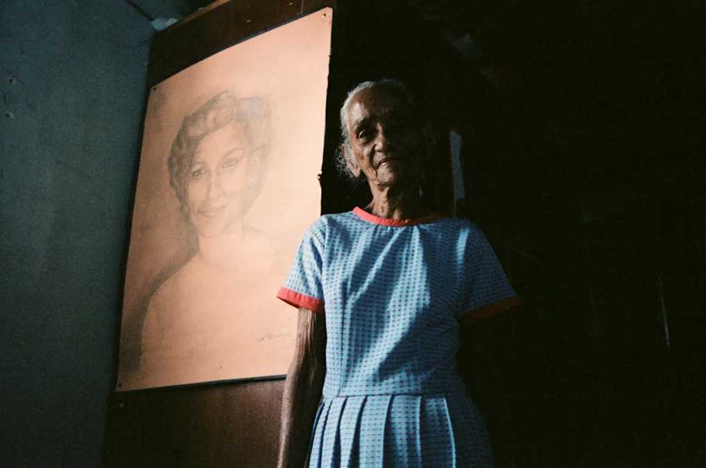 La Conchita with a drawing of her grand niece Milena Montano.