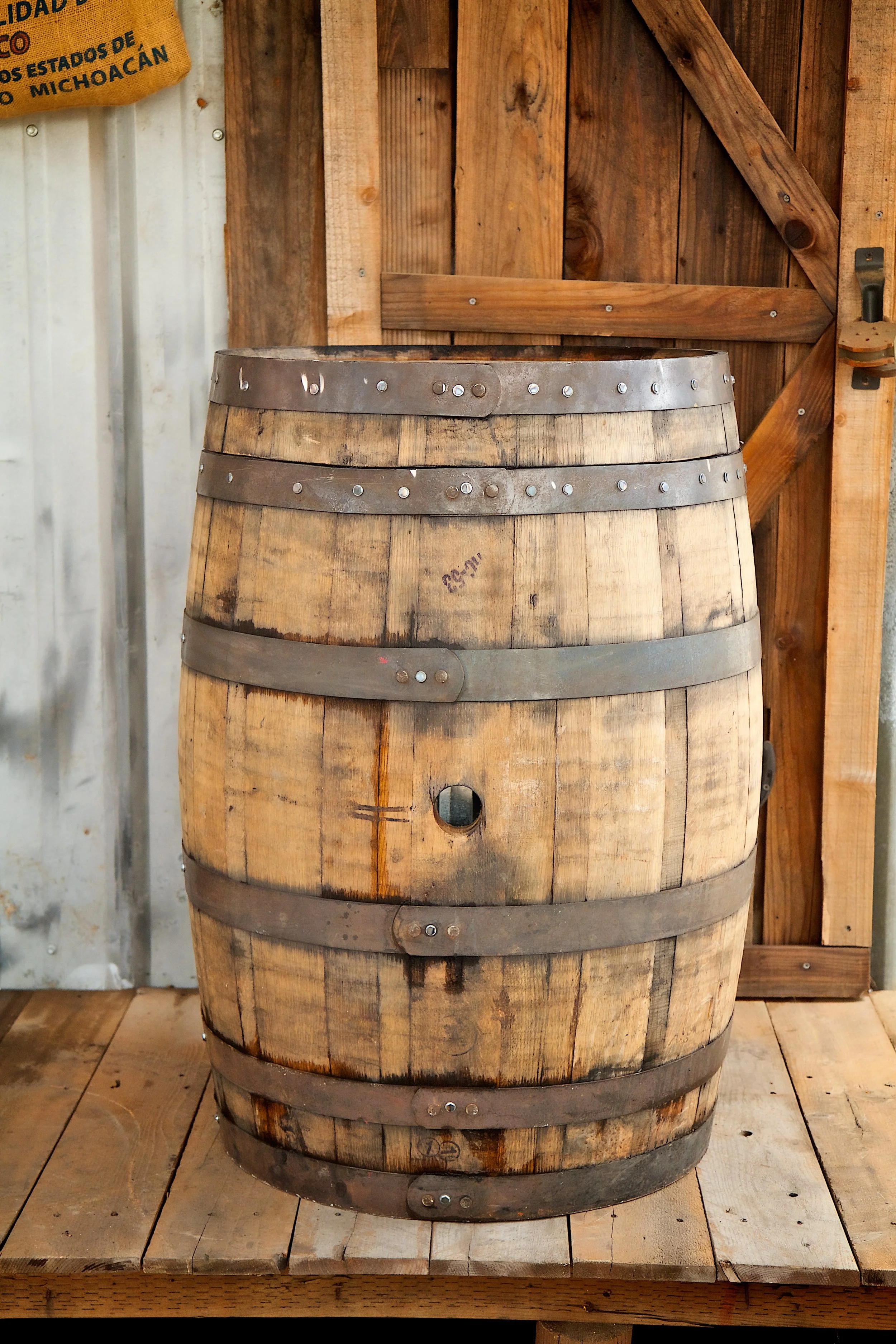 Whiskey barrel trash can.jpg
