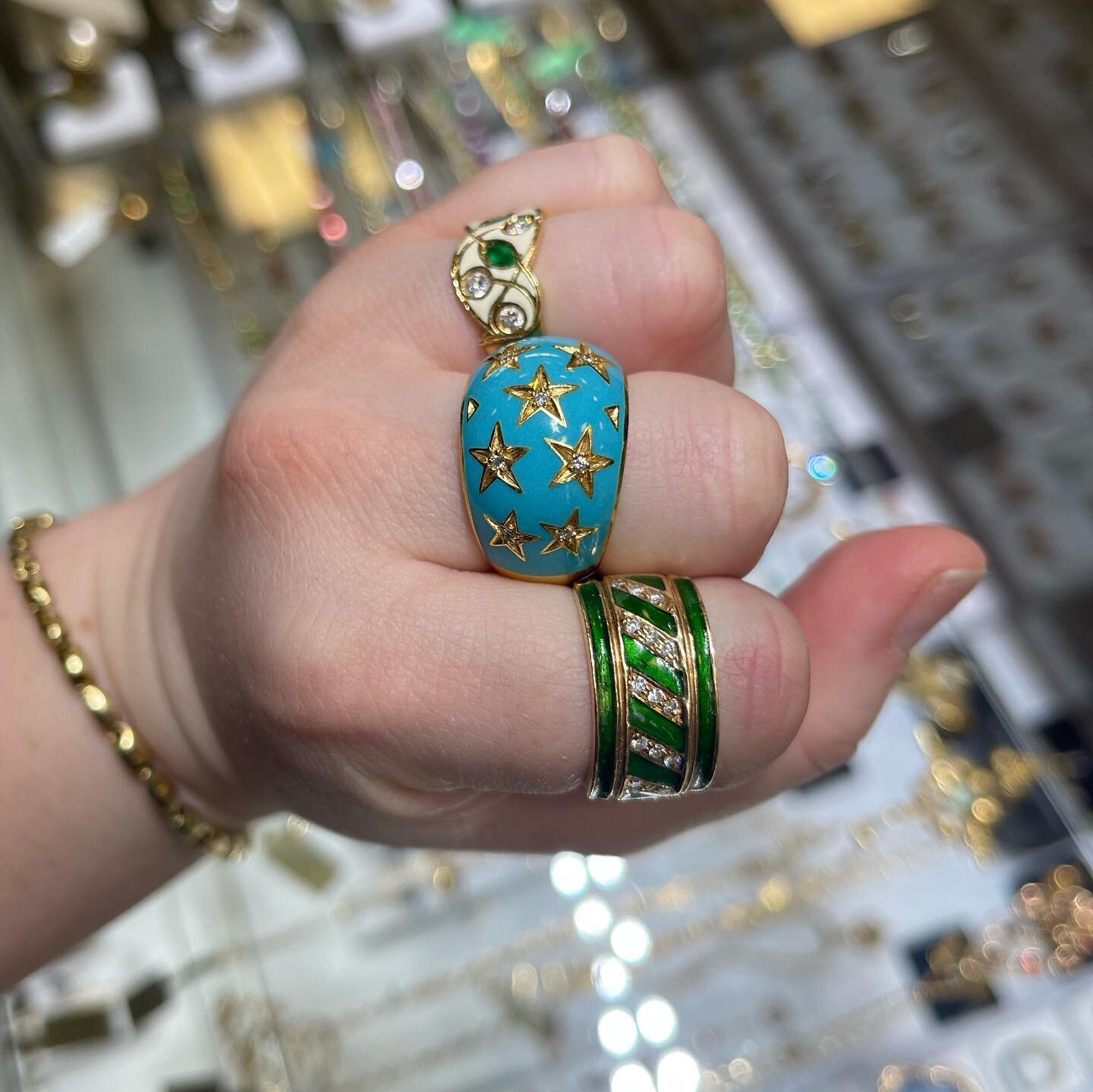 Stars and Stripes! 💫 Three enamel rings featuring a sprinkle of diamonds and emeralds. The center ring is my favorite, which one is yours? ⭐️ 

#celestialjewelry #vintage #vintagejewelry #oneofakindjewelry #enamel #uniquejewelry #stack #jewels #smal