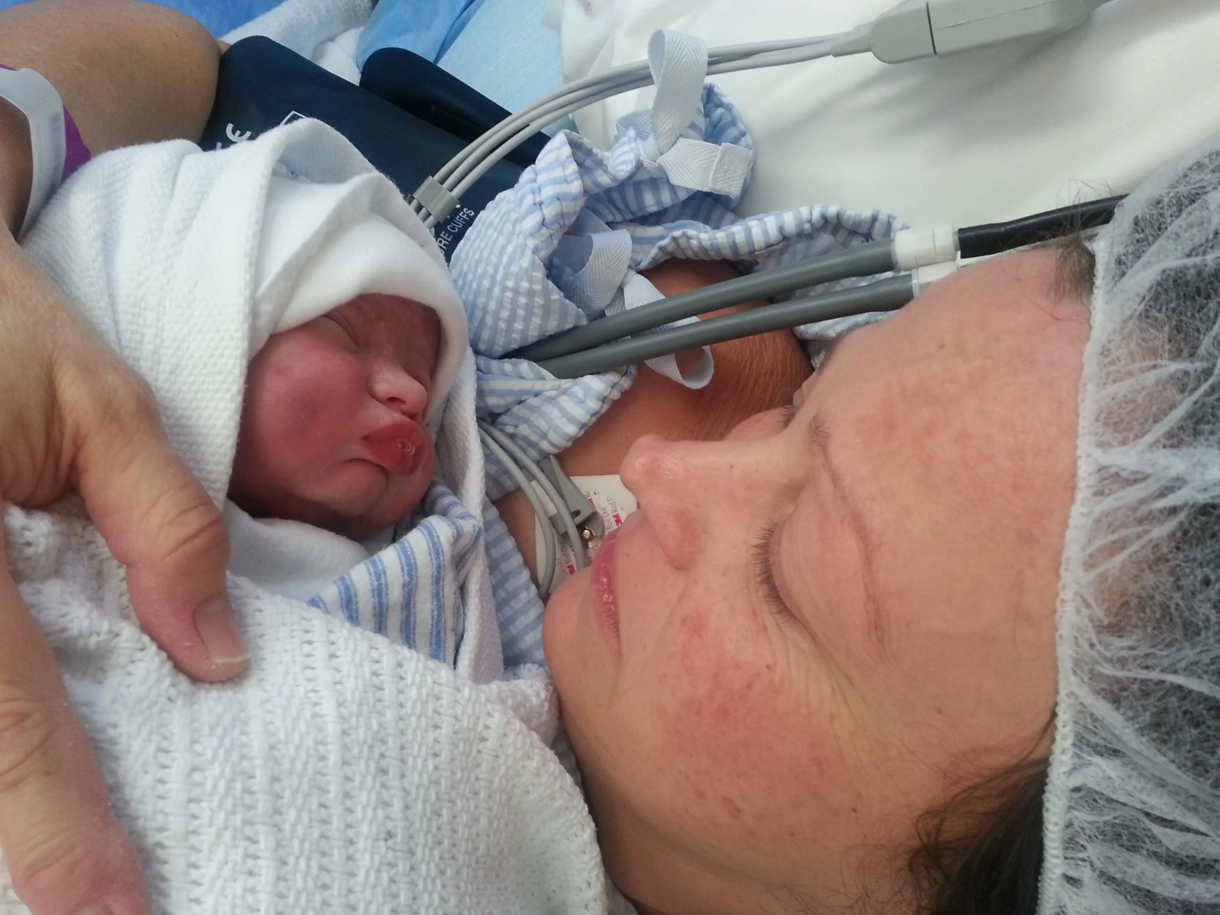 Sam just born and cuddles straight away