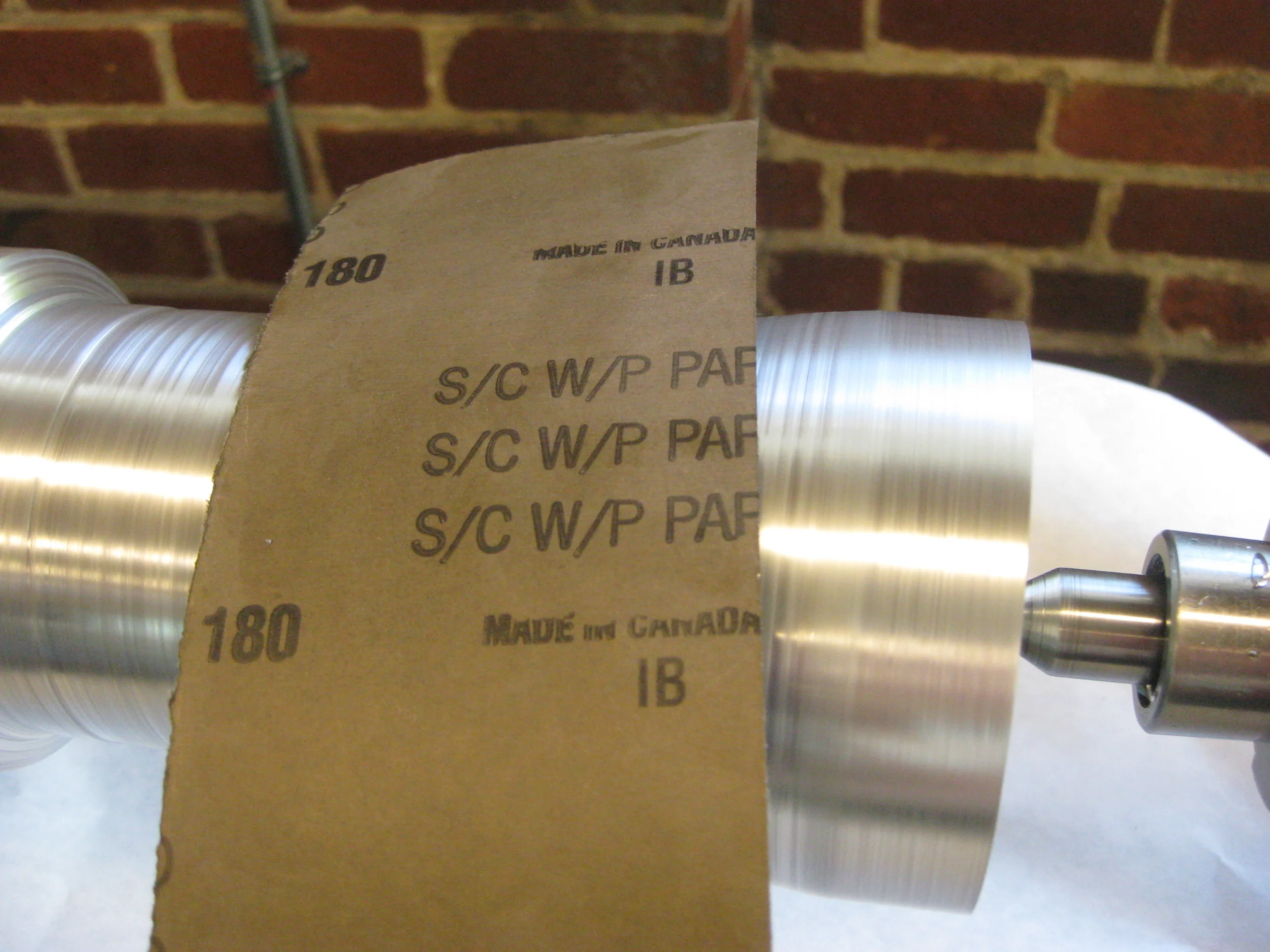  Rough sanding on the lathe 