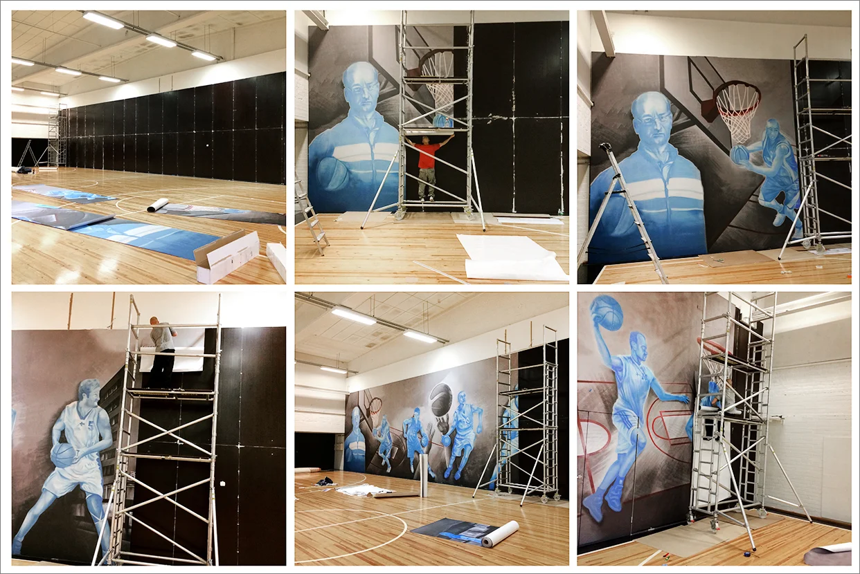 Seinä toteutettiin 120x500cm kokoisina paloina lattialaminoidusta tarrasta. Asennus kesti noin 15 tuntia.