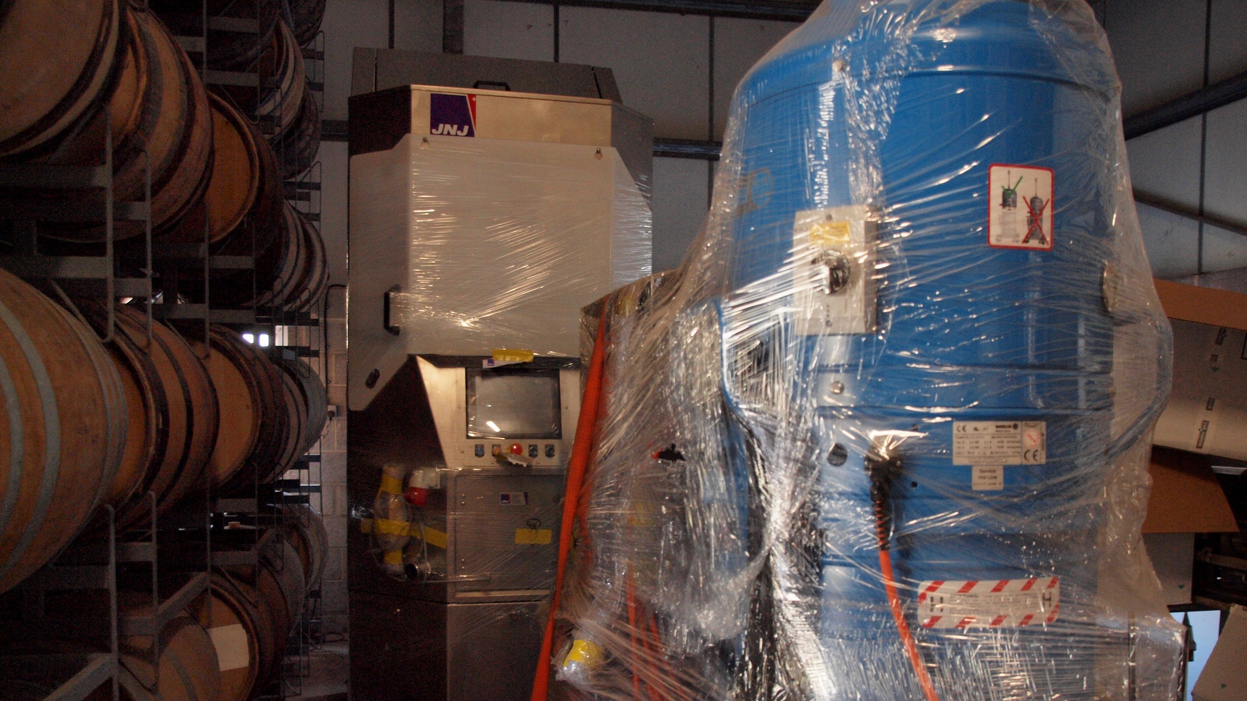 Our cheese robot, champing at the bit to get out of its wrapping and start turning wheels of Westcombe Cheddar!
