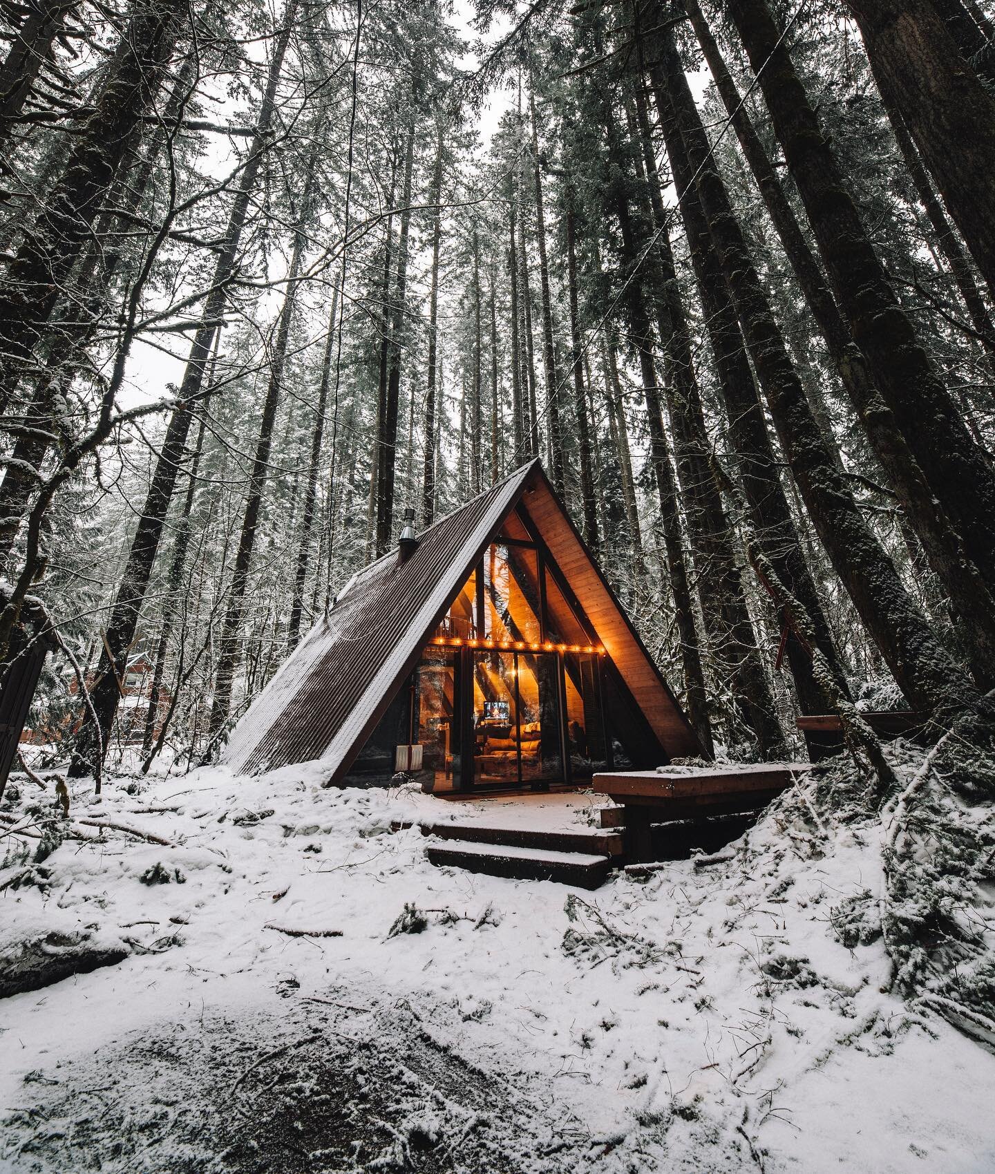 #skyhaus in her natural environment 🥰. Snow is falling this week and we are psyched 🎿 🏂. @dipsauce always hits the mark with our #aframes, cheers brother as always 🍻📸. All cabins this year will be equipped with 2 pair of snowshoes. Snow dances e