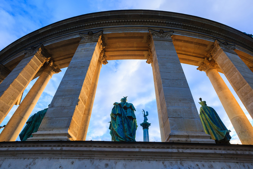 Millennium Monument on the Heroes' Square. Blurred-unrecognizable faces of people. Is one of the most-visited attractions in Budapest squares in Budapest, Hungary.