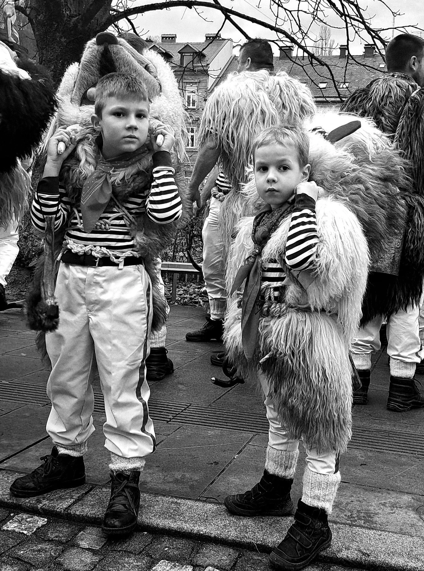 Ljubljana, Carnival time.
For a few days the city belongs to bells, fur, horns, and something much older than tourism.

Kurenti passing through Ljubljana during Carnival, bells and fur echoing a ritual that comes from Ptuj, not the city streets. a ri