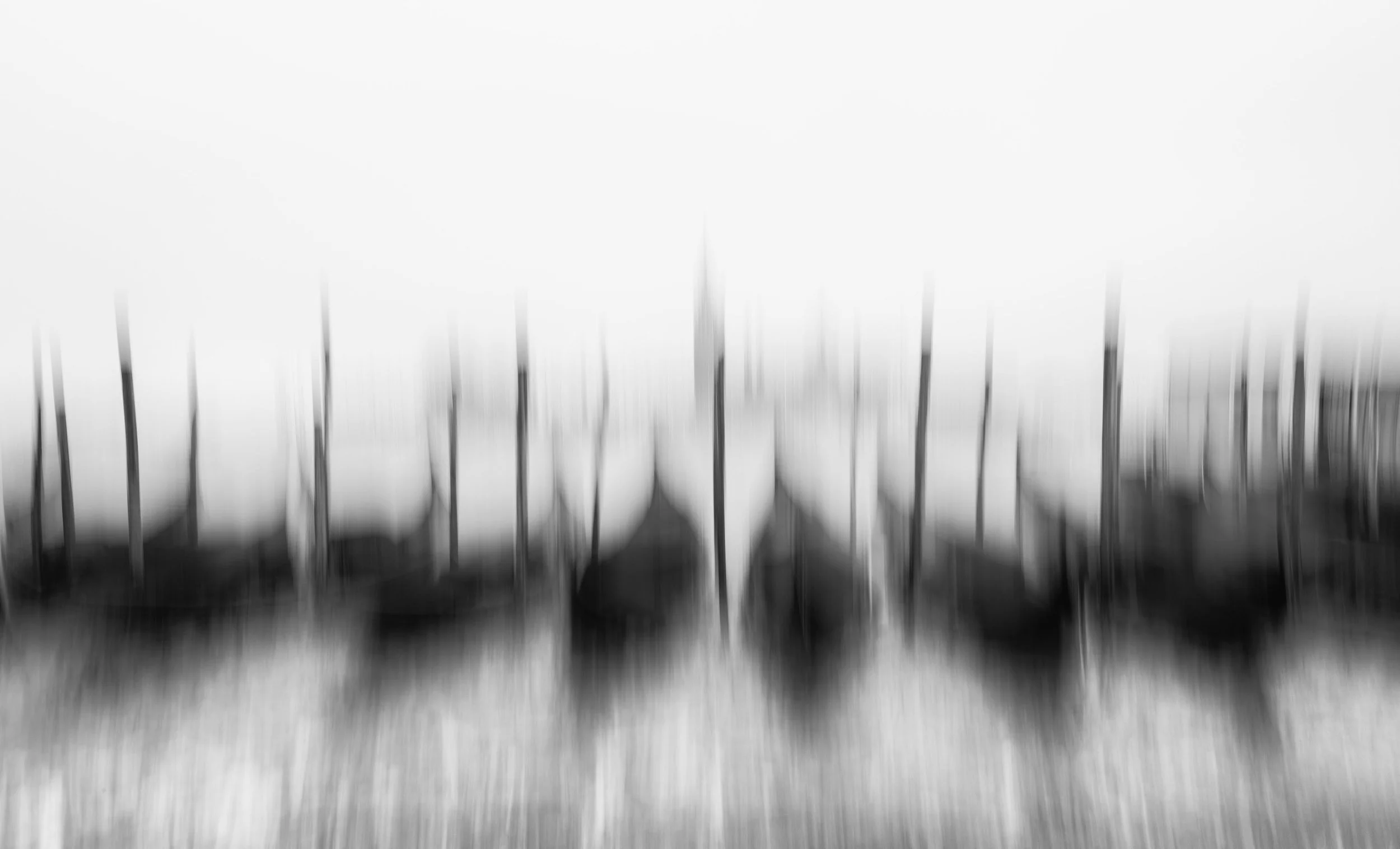 Some photographs describe the world. Others try to remember how it felt.

By allowing detail to dissolve, the familiar becomes uncertain. Trees become marks, distance becomes atmosphere, and the landscape begins to hover somewhere between a real plac