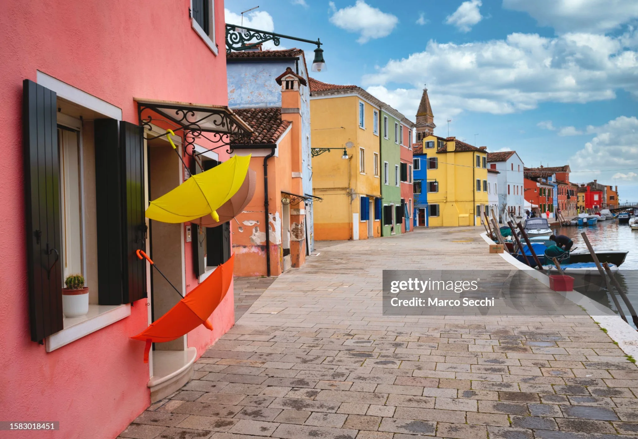 From my @gettyimages on #Burano

Burano is often reduced to colour, as if its painted walls were enough to make the photograph. They are not.

The real interest lies in the relationships between colour, geometry, water and daily life. A strong photog