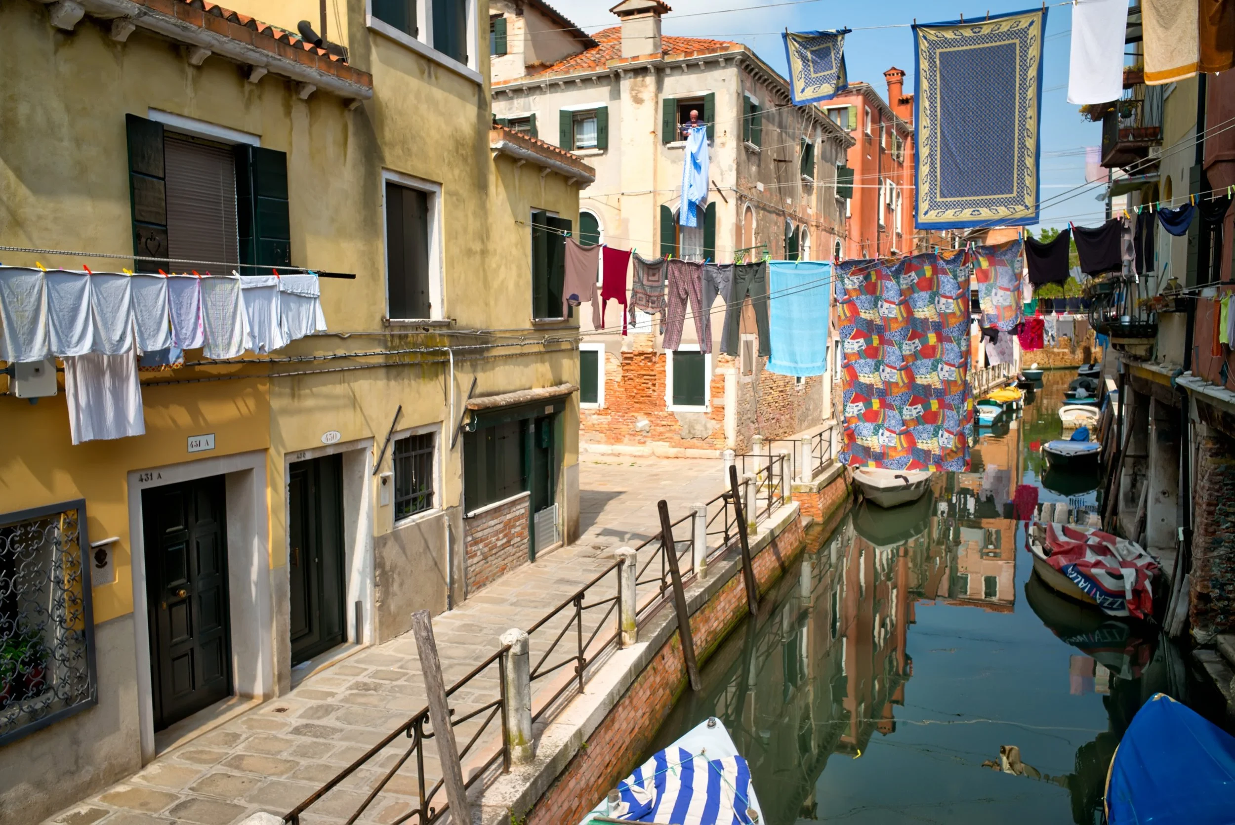 Some days, the washing does most of the composing. Colour, pattern and lines strung across a canal, with someone at an upstairs window quietly getting on with the day.

This is the Venice I enjoy photographing: ordinary life with plenty to notice. If