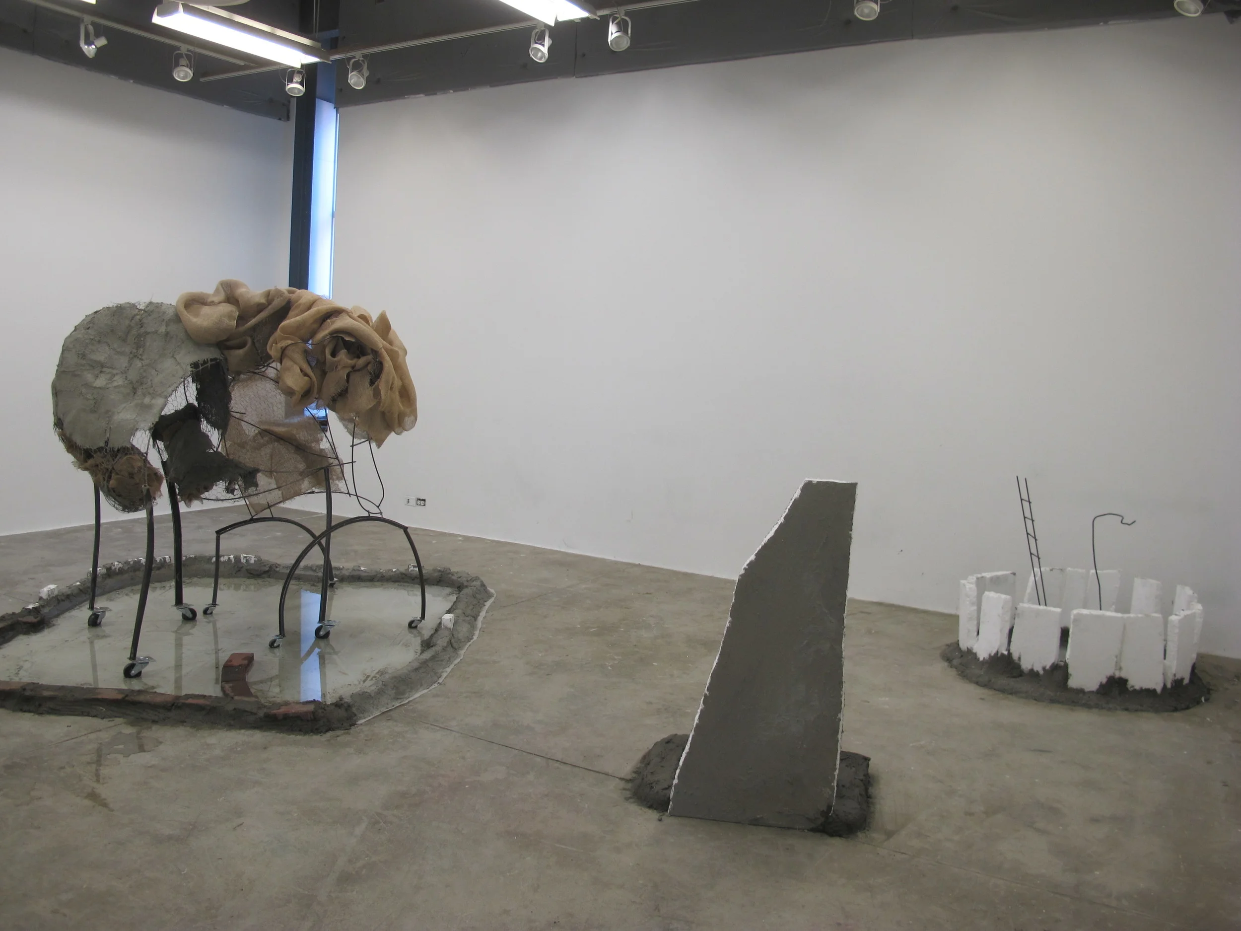  Silu Lee  2014  Steel, clay, plaster, plastic bag, audio of plastic bag blowing in the wind 7’x4’x5’  Wind in Grocery Bag 