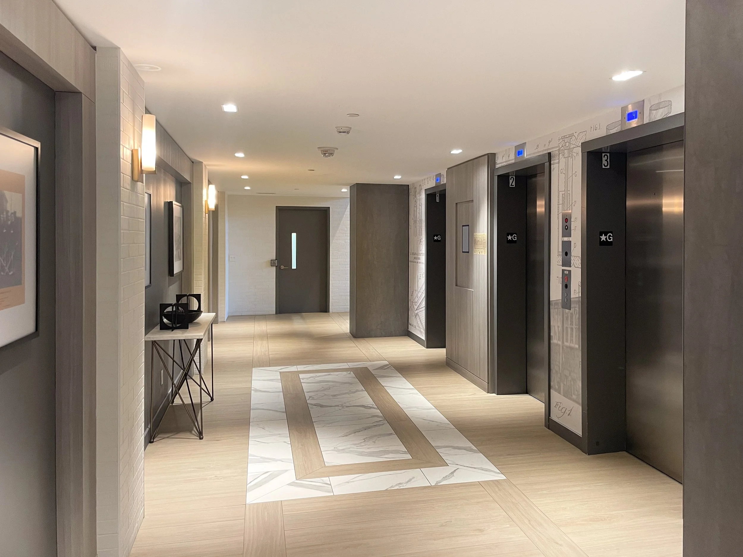 Railroad Elevator Lobby in Brampton by Studio 8 Design