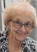Photo of Marilyn Wuttke, smiling big.