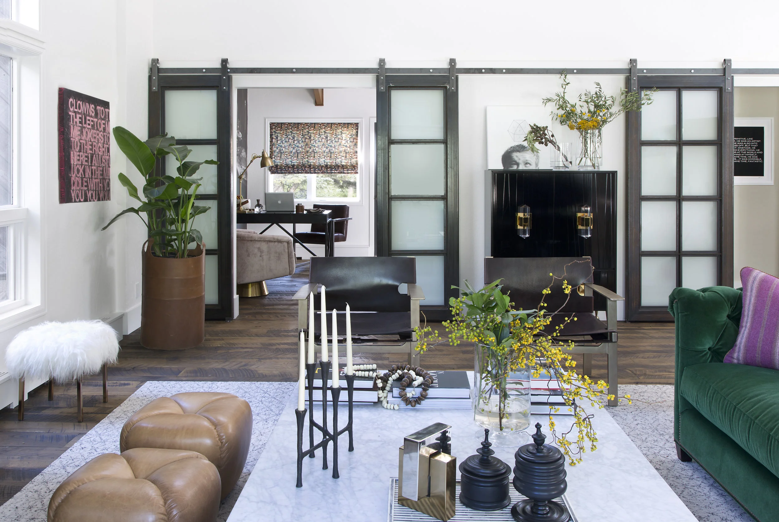 Luxe Interiors + Design. Design: Erin Iba of Iba Design Associates. Photography: Emily Minton Redfield. Artists: Eric Corrigan (left), Tim Main (right).